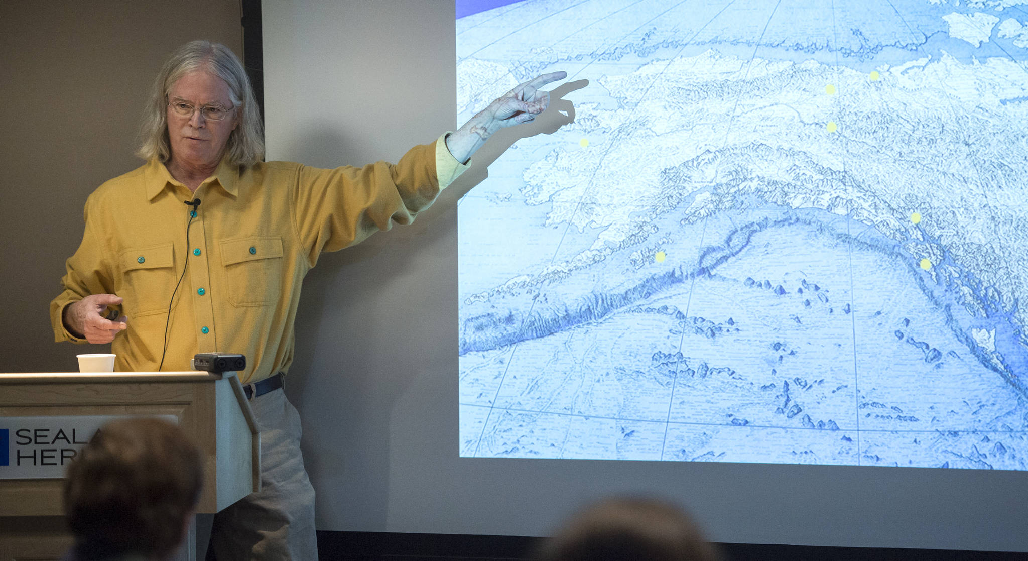 John Cloud, an independent historian of geography and cartography, gives a lecture titled “The Treaty of Cession, as Seen through the Lenses of Art, Cartography, and Photography,” at the Walter Soboleff Center on Wednesday, Nov. 15, 2017. (Michael Penn | Juneau Empire)