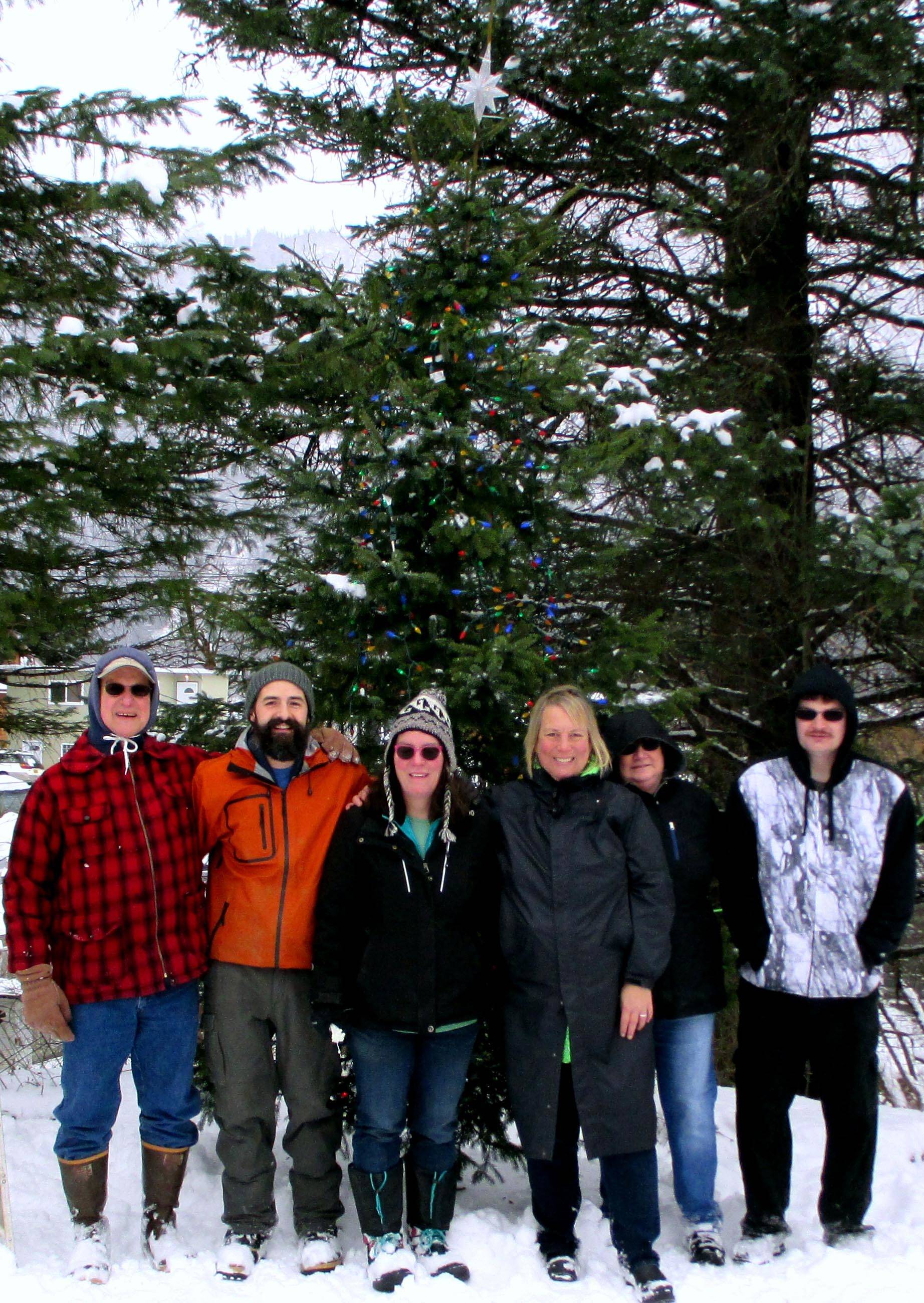 From left, Harold Pence, David Eckerson, Molly Mcormick, Justine Bishop, Maggie Swanson and Bjorn Ford stand in front of the Douglas Christmas Tree. (Photo courtesy of the Douglas Fourth of July Committee)