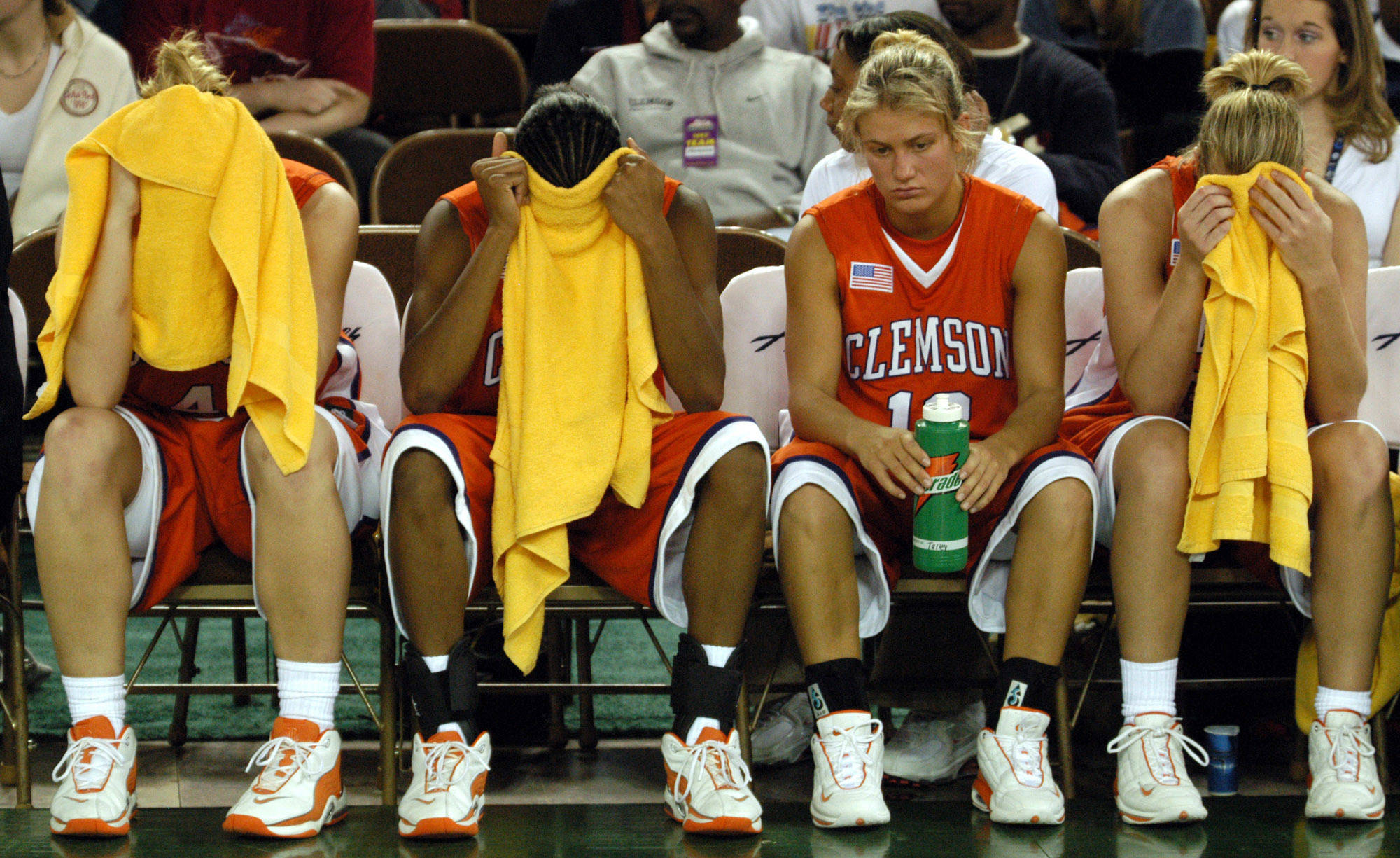 In this Nov. 26, 2003 photo, from left, Clemson’s Maggie Slosser, Lakeia Stokes, Julie Talley and Julie Aderhold sit on the bench after Clemson’s 61-58 loss to Alasaka-Anchorage in the championship game of the Great Alaska Shootout on in Anchorage, Alaska. Shootout fans over the years witnessed the best of college basketball, with Duke, North Carolina, Kentucky, Michigan State and UCLA winning titles, but the end is near. The 40th Shootout will be the last, a victim of changed rules and competition. (Michael Dinneen | The Associated Press File)