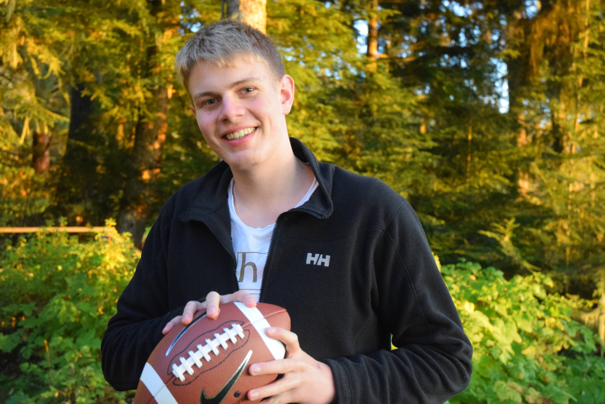Gregor Schniewindt, 16, a Thunder Mountain High School junior German exchange student with the Rotary Club, in the seaside backyard of his host family this fall. The Neuenrade, Germany native played for the TMHS football team this year. (Nolin Ainsworth | Juneau Empire)
