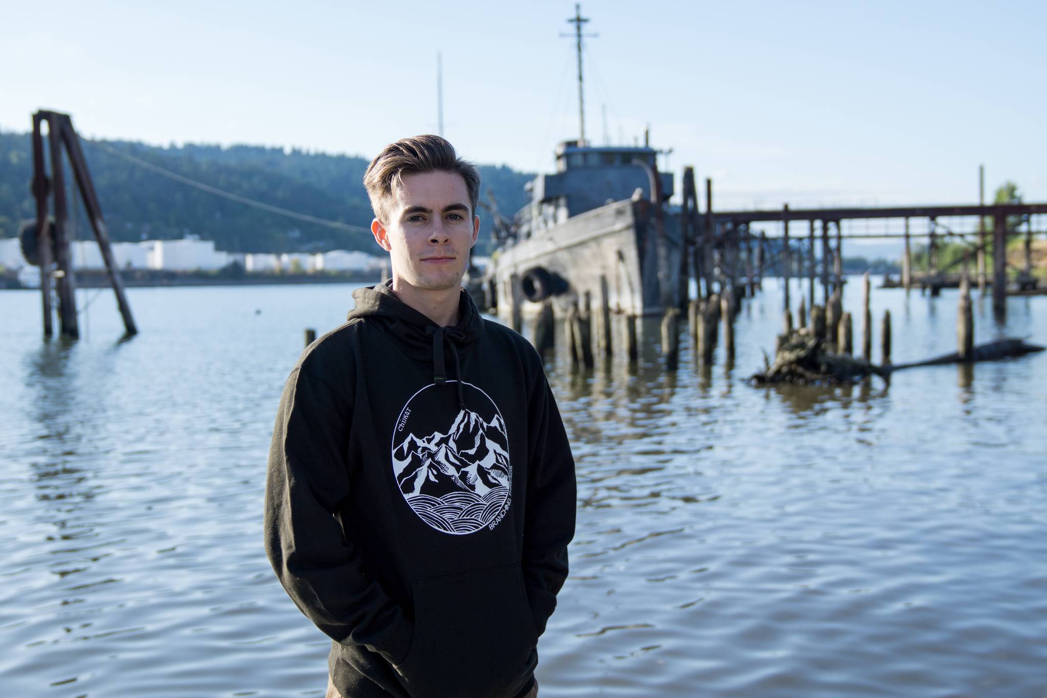Will Sorenson stands in a Branching Threads sweatshirt. Branching Threads, run by Juneau local Grant Ainsworth, is one of the new companies coming to the annual Public Market this weekend. (Photo by Marty Ramos)
