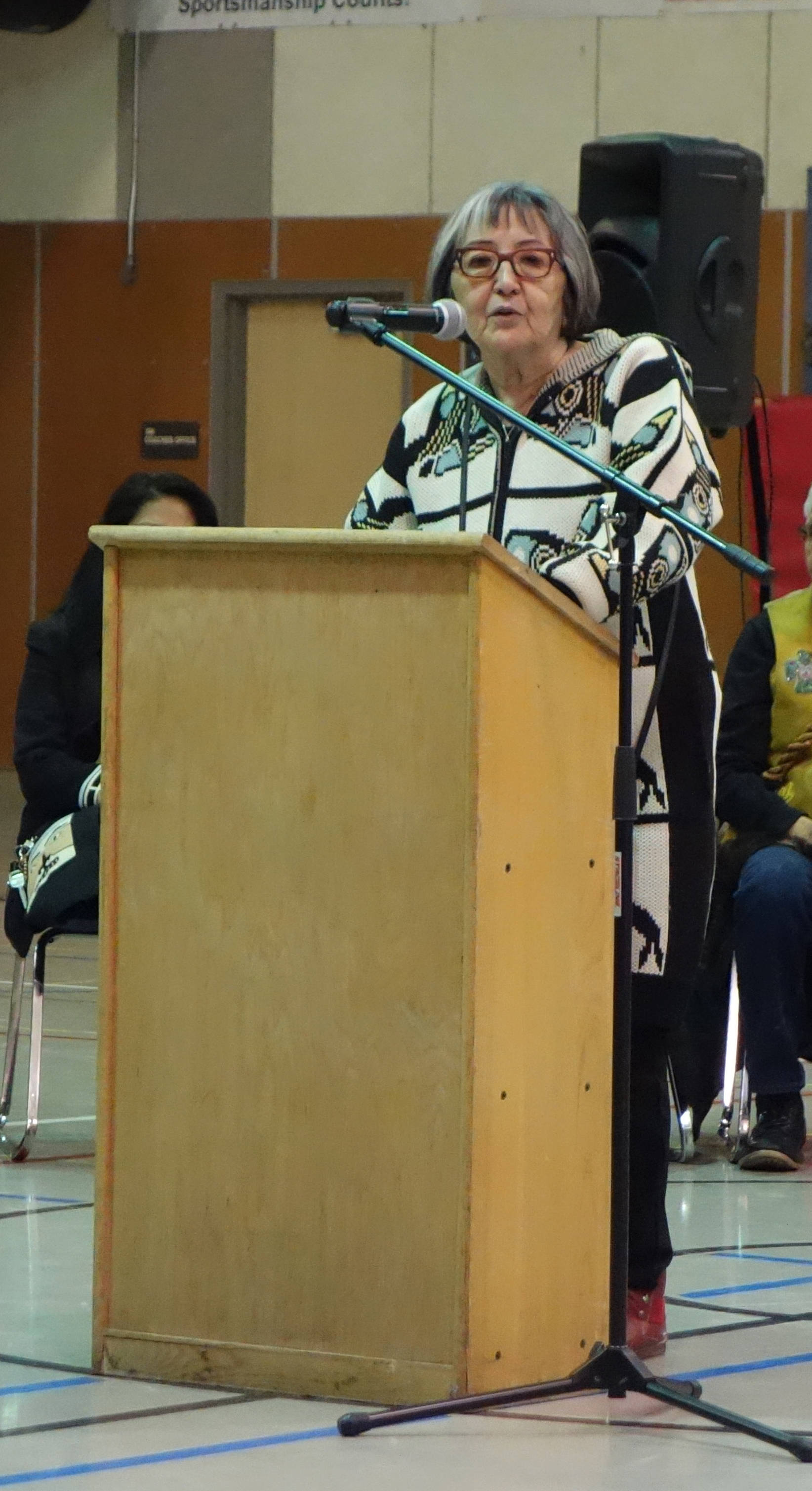President of Sealaska Heritage Rosita Worl of the Shangukeidi Clan speaks at the “Transfer of Core Cultural Values Panels Ceremony” at Floyd Dryden Middle School on Wednesday, Nov. 22. (Clara Miller | Capital City Weekly)