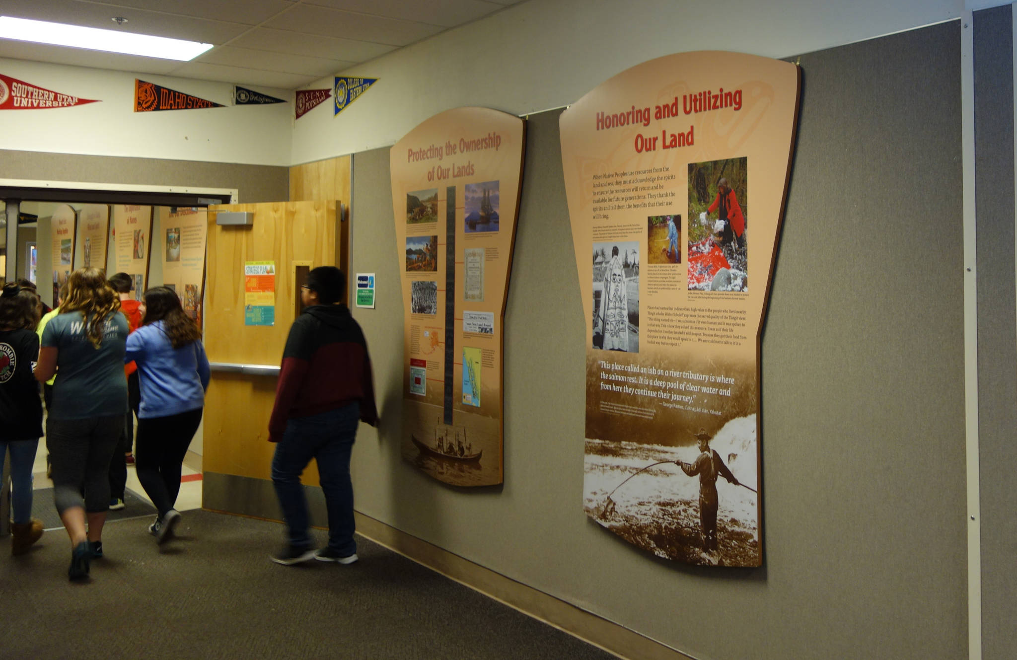Students walk past the newly installed Core Cultural Values Panels at Floyd Dryden Middle School on Wednesday, Nov. 22. (Clara Miller | Capital City Weekly)