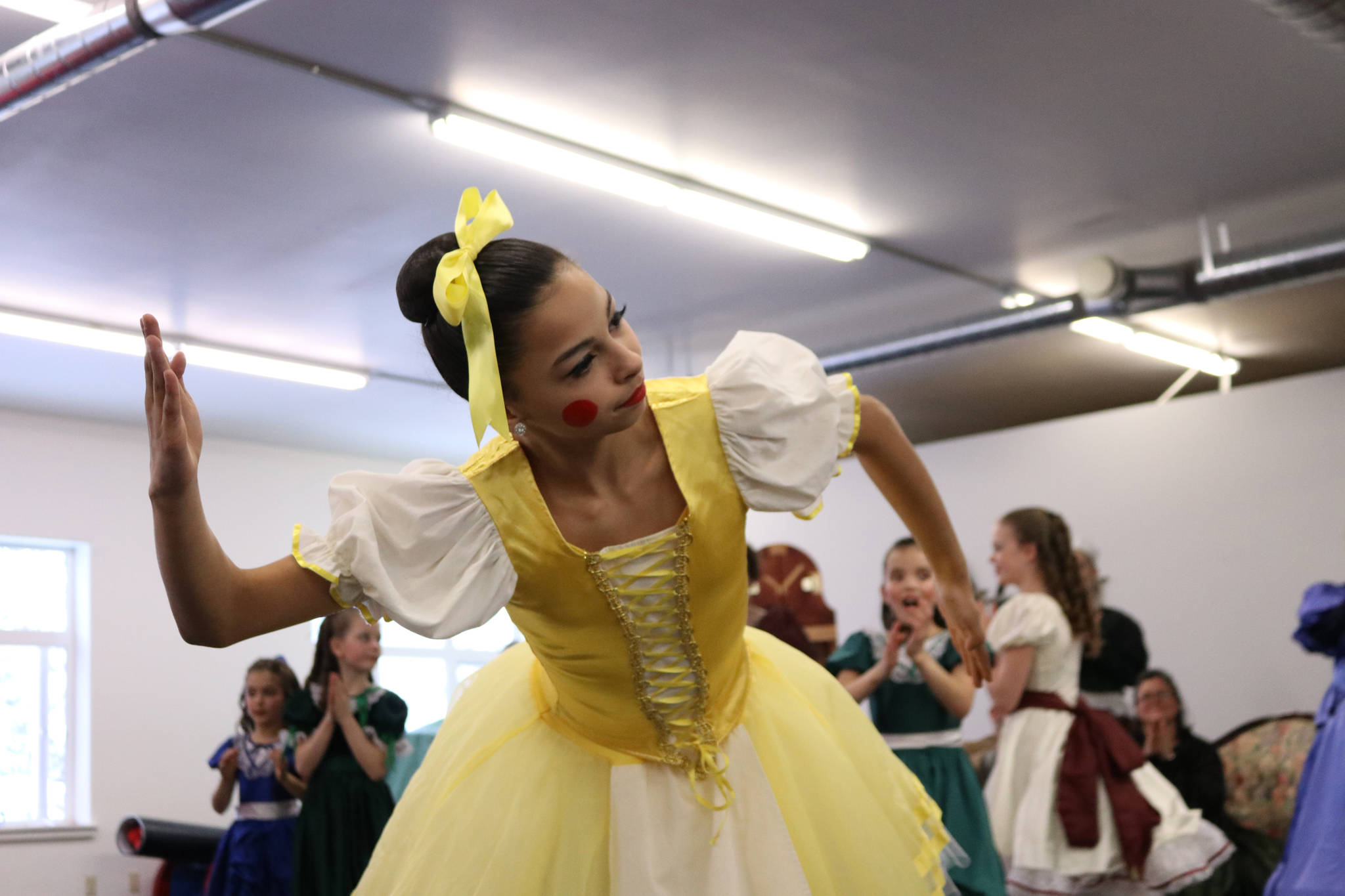 Megan Lujan, 14, as a mechanical doll for Herr Drosselmeyer’s entertainment for the children during the party scene. (Erin Laughlin | For the Capital City Weekly)