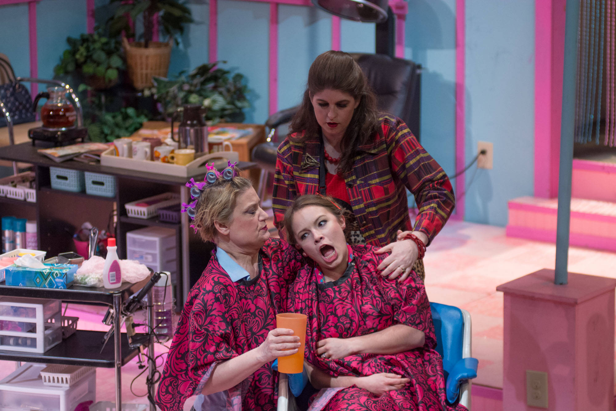 Katie Jensen as M’Lynn, Stacy Stout Katasse as Truvy, and Naomi Prentice as Shelby in Perseverance Theatre’s production of “Steel Magnolias.” (Photo by Cameron Byrnes)