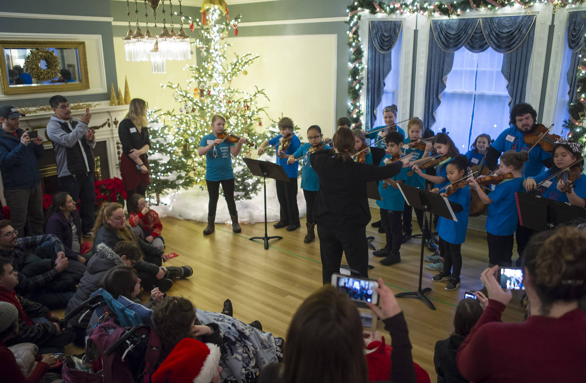 Fifth-graders in the JAMM program at Glacier Valley Elementary School perform during the Governor’s Open House on Tuesday, Dec. 5, 2017. (Michael Penn | Juneau Empire)