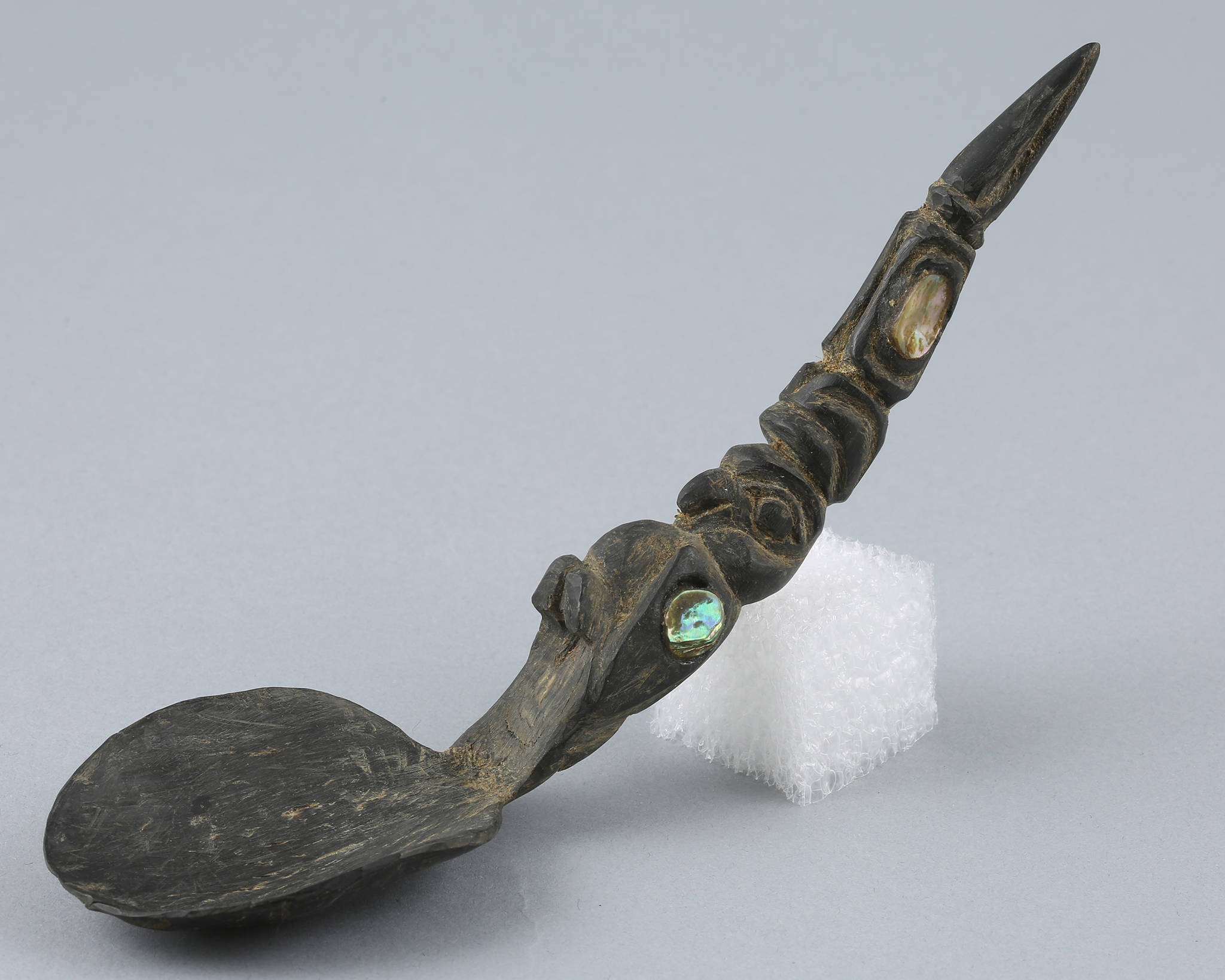 A carved goat horn spoon from the Sealaska Heritage Institute archive. Sealaska Heritage Institute artifact collection. All images are the property of the Sealaska Heritage Institute. Photo by Brian Wallace.