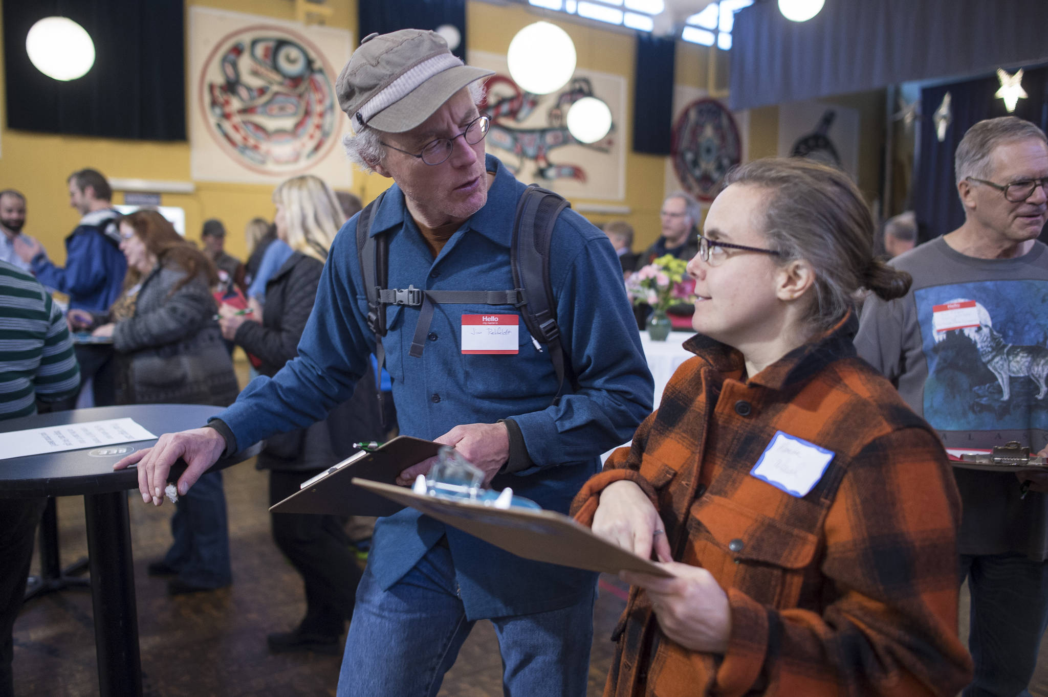 Engineer Jim Rehfeldt trades information with Glacier Valley Elementary Teacher Mareta Weed during a networking event for teachers and STEM community members at the Juneau Arts and Culture Center on Tuesday, Oct. 17, 2017. The SouthEast Exchange is a new collaboration started by scientists and school teachers, in conjunction with the Juneau STEM Coalition and JEDC. Its broad mission is to share ideas, experience and knowledge within our community and, particularly, to facilitate connections among professionals and teachers to enrich education for Juneau students. (Michael Penn | Juneau Empire File)