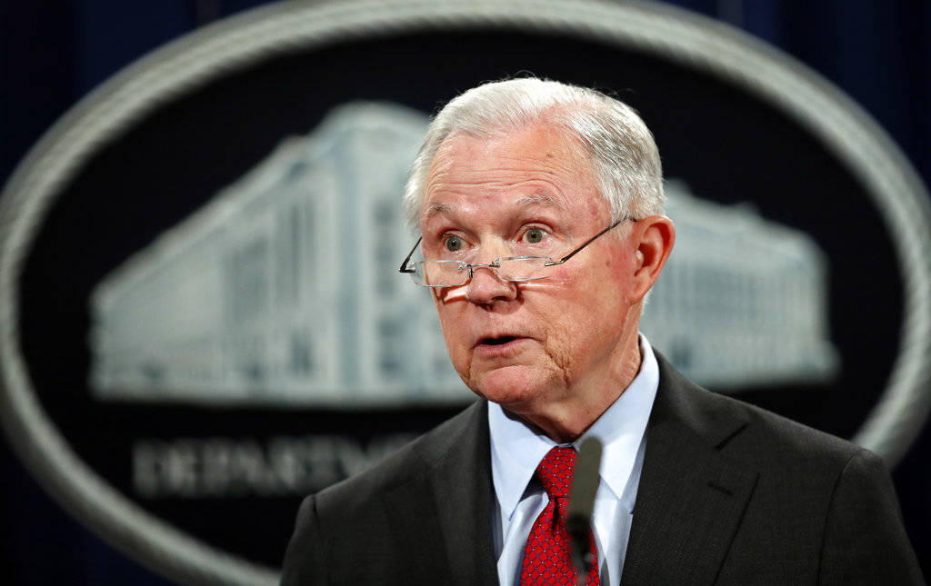 In this Dec. 15, 2017 photo, United States Attorney General Jeff Sessions speaks during a news conference at the Justice Department in Washington. Attorney General Jeff Sessions is going after legalized marijuana. Sessions is rescinding a policy that had let legalized marijuana flourish without federal intervention across the country. That’s according to two people with direct knowledge of the decision. (Carolyn Kaster | The Associated Press File)
