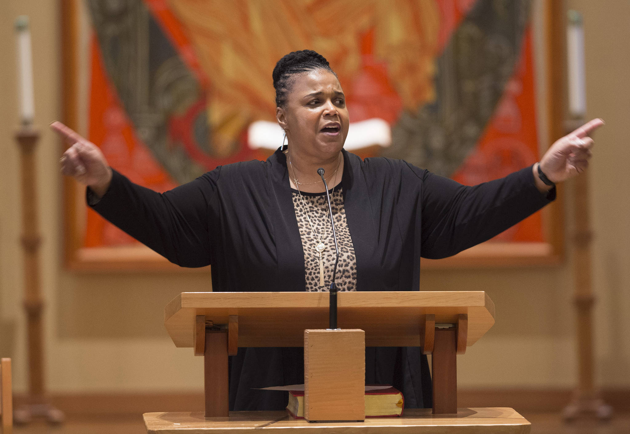 Sherry Patterson, president of the Black Awareness Association, gives the keynote address to Juneau residents during the Dr. Martin Luther King Jr. 2018 Community Celebration sponsored by the Black Awareness Association at St. Paul’s Catholic Church on Monday, Jan. 15, 2018. (Michael Penn | Juneau Empire)