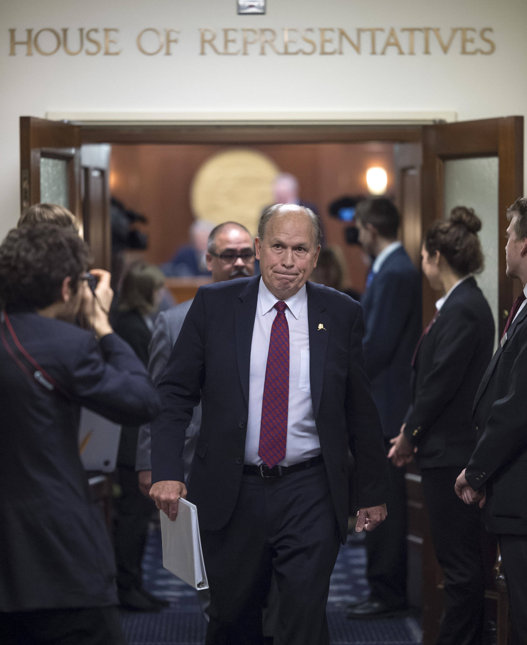 Gov. Bill Walker walks out the House of Representatives after his State of the State address before a joint session of the Alaska Legislature at the Capitol on Thursday, Jan. 18, 2018. (Michael Penn | Juneau Empire)