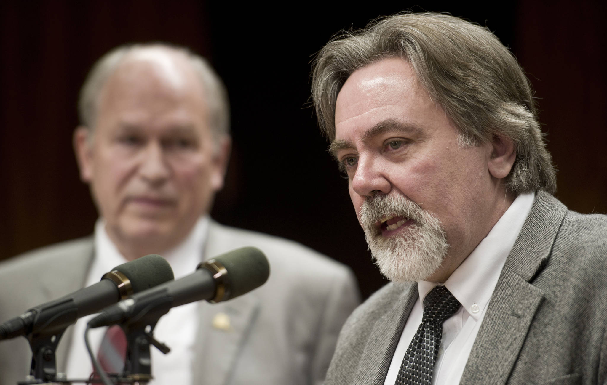 Randall Hoffbeck, Commissioner for the Department of Revenue, right, give their Spring Revenue Forecast with Gov. Bill Walker during a press conference at the Capitol on March 21, 2016. (Michael Penn | Juneau Empire File)