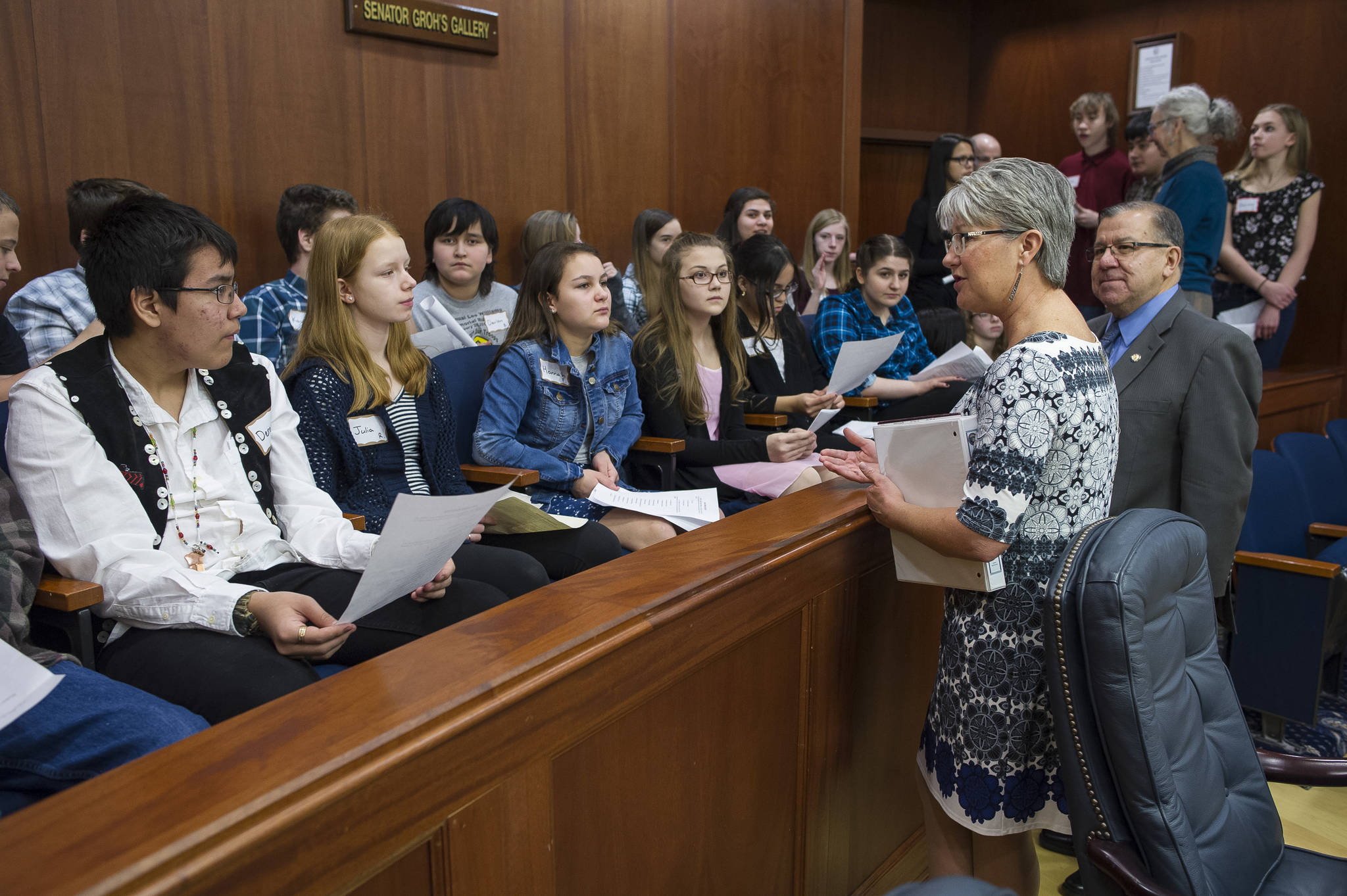Sen. Anna MacKinnon, R-Eagle River, and Sen. Lyman Hoffman, D-Bethel, speak to Floyd Dryden Middle School eighth grade students just before a floor session at the Capitol on Monday, Jan. 29, 2018. The League of Women Voters of Juneau and The Alaska Committee are sponsoring a program to bring all of Juneau’s 400 eighth grade students to the Capitol for an introduction to the executive, legislative and judicial branches. (Michael Penn | Juneau Empire)
