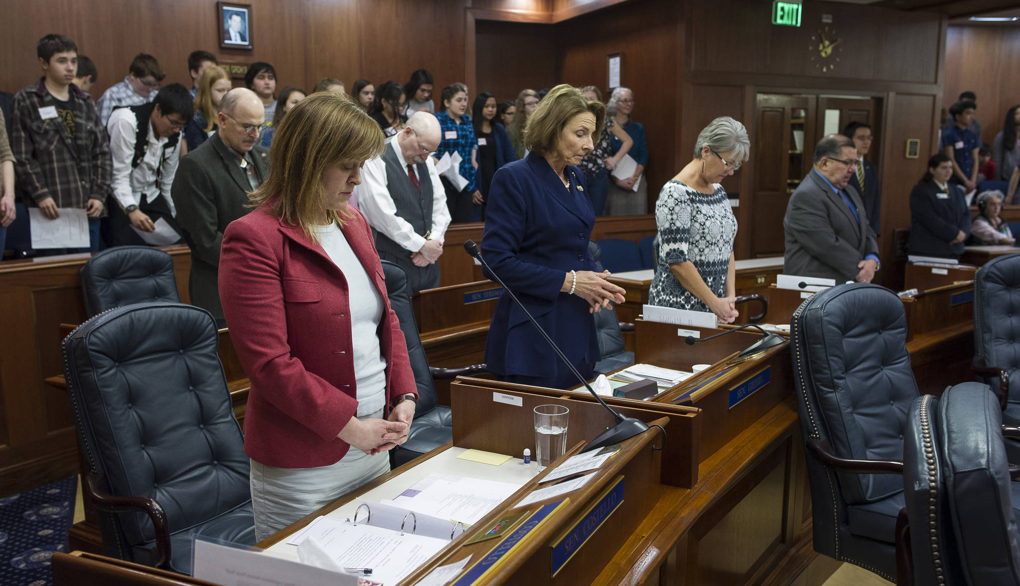 Senators take a moment of silence at the Capitol on Monday, Jan, 29, 2018, in memory of three Alaskan servicemen killed in action. The senate voted in favor of Senate Concurrent Resolution 14 to award the Alaska Decoration of Honor to David T. Brabander, Hansen B. Kirkpatrick and Jacob M. Sims. (Michael Penn | Juneau Empire)
