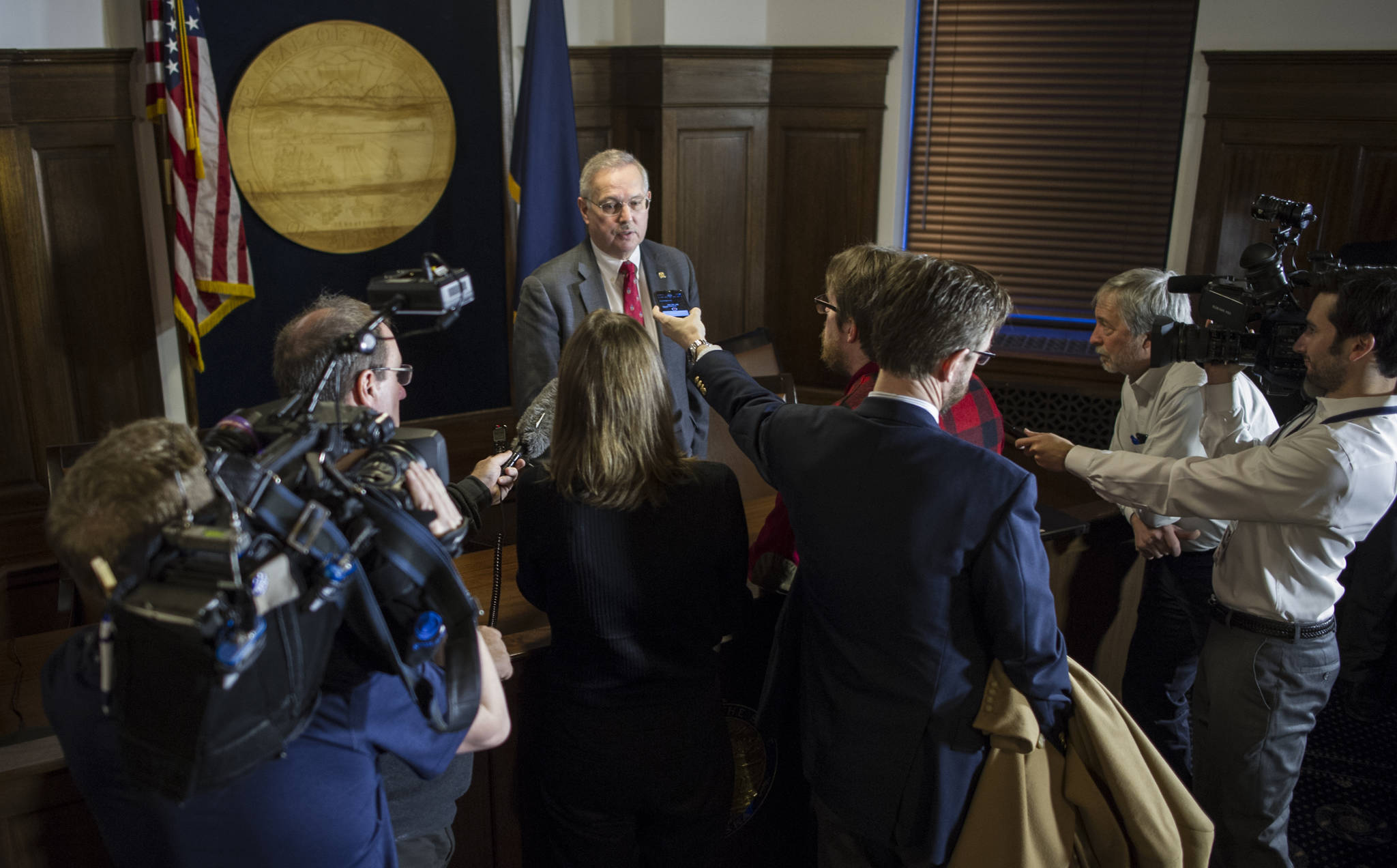 Speaker of the House Rep. Bryce Edgmon, D-Dillingham, is questioned by reporters about Rep. Zach Fansler, D-Bethel, at the Capitol on Tuesday, Jan. 30, 2018. Rep. Fansler has been accused of striking a woman in his hotel room last week. (Michael Penn | Juneau Empire)  Speaker of the House Rep. Bryce Edgmon, D-Dillingham, is questioned by reporters about Rep. Zach Fansler, D-Bethel, at the Capitol on Tuesday, Jan. 30, 2018. Rep. Fansler has been accused of striking a woman in his hotel room last week. (Michael Penn | Juneau Empire)
