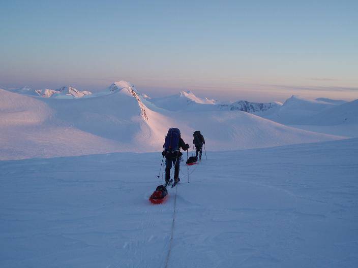 Ed Shanley and Dennis Hall ski along the northern side of the Taku Range on the Juneau icefield. (Photo by Bjorn Dihle)