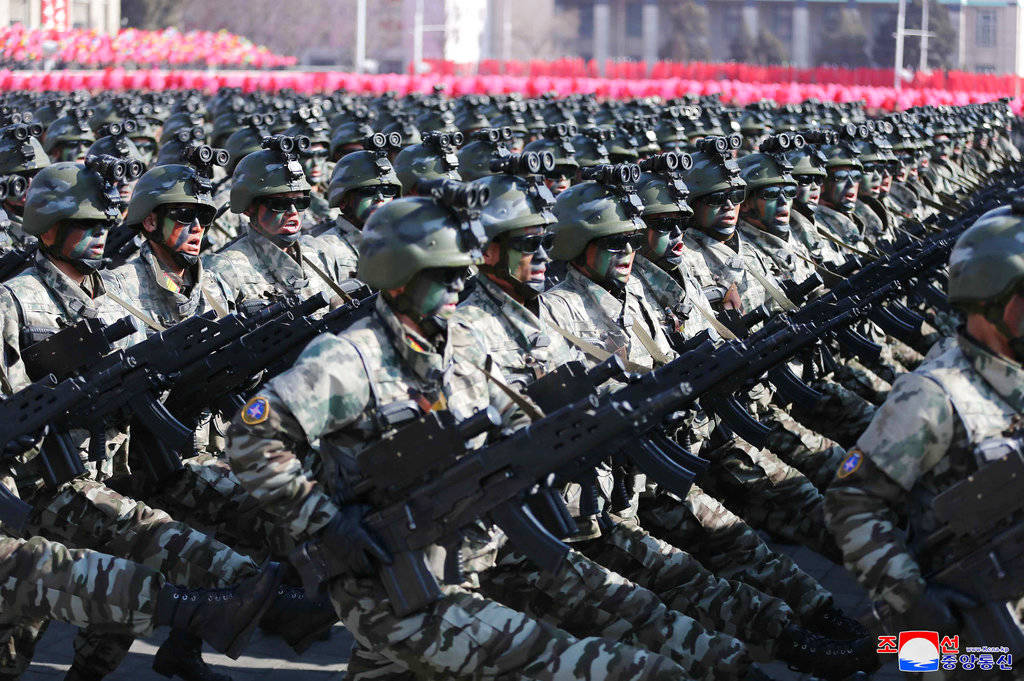 In this Feb. 8, 2018 photo provided by the North Korean government, North Korean soldiers march during a military parade to mark the 70th anniversary of the founding of its military in Pyongyang, North Korea. Independent journalists were not given access to cover the event depicted in this image distributed by the North Korean government. The content of this image is as provided and cannot be independently verified. Korean language watermark on image as provided by source reads: &ldquo;KCNA&rdquo; which is the abbreviation for Korean Central News Agency. (Korean Central News Agency)