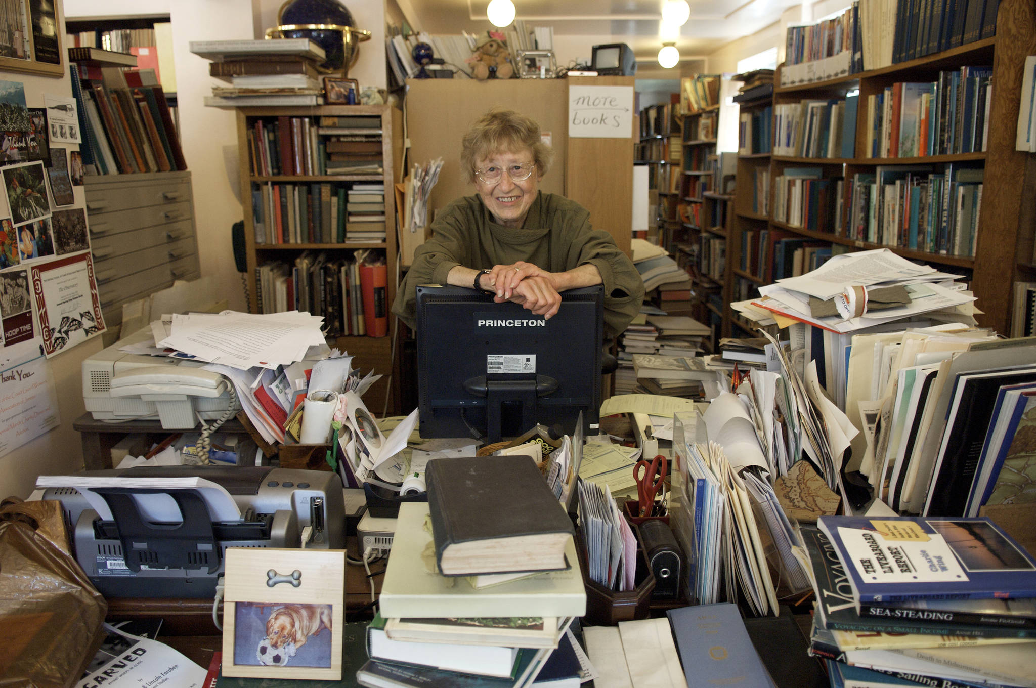 Dee Longenbaugh at her desk at her bookshop, The Observatory, in Juneau, Alaska, on July 29, 2009. (Michael Penn | Juneau Empire File)