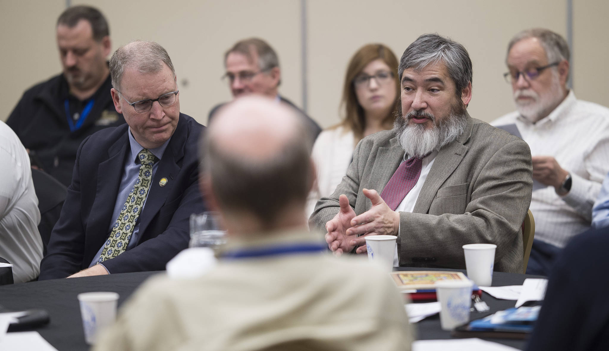 Rep. Sam Kito III, D-Juneau, right, speaks alongside Marc Luiken, Commissioner of the Department of Transportation and Public Facilities during a breakout session on Alaska Marine Highway System Reform at Southeast Conference at the Elizabeth Peratrovich Hall on Wednesday, Feb. 14, 2018. (Michael Penn | Juneau Empire)