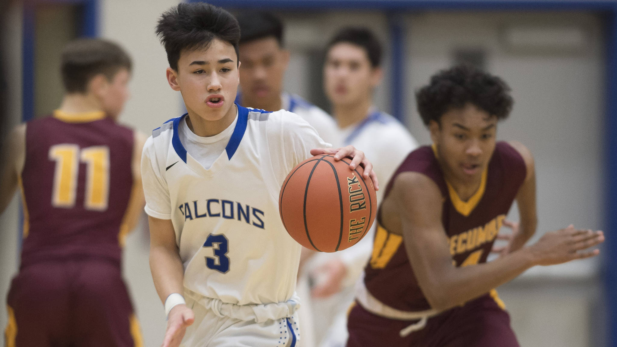 Thunder Mountain&rsquo;s Bryson Echiverri, left, steals the ball from Mt. Edgecumbe&rsquo;s Emmett Dunaway at TMHS on Friday, Feb. 16, 2018. (Michael Penn | Juneau Empire)