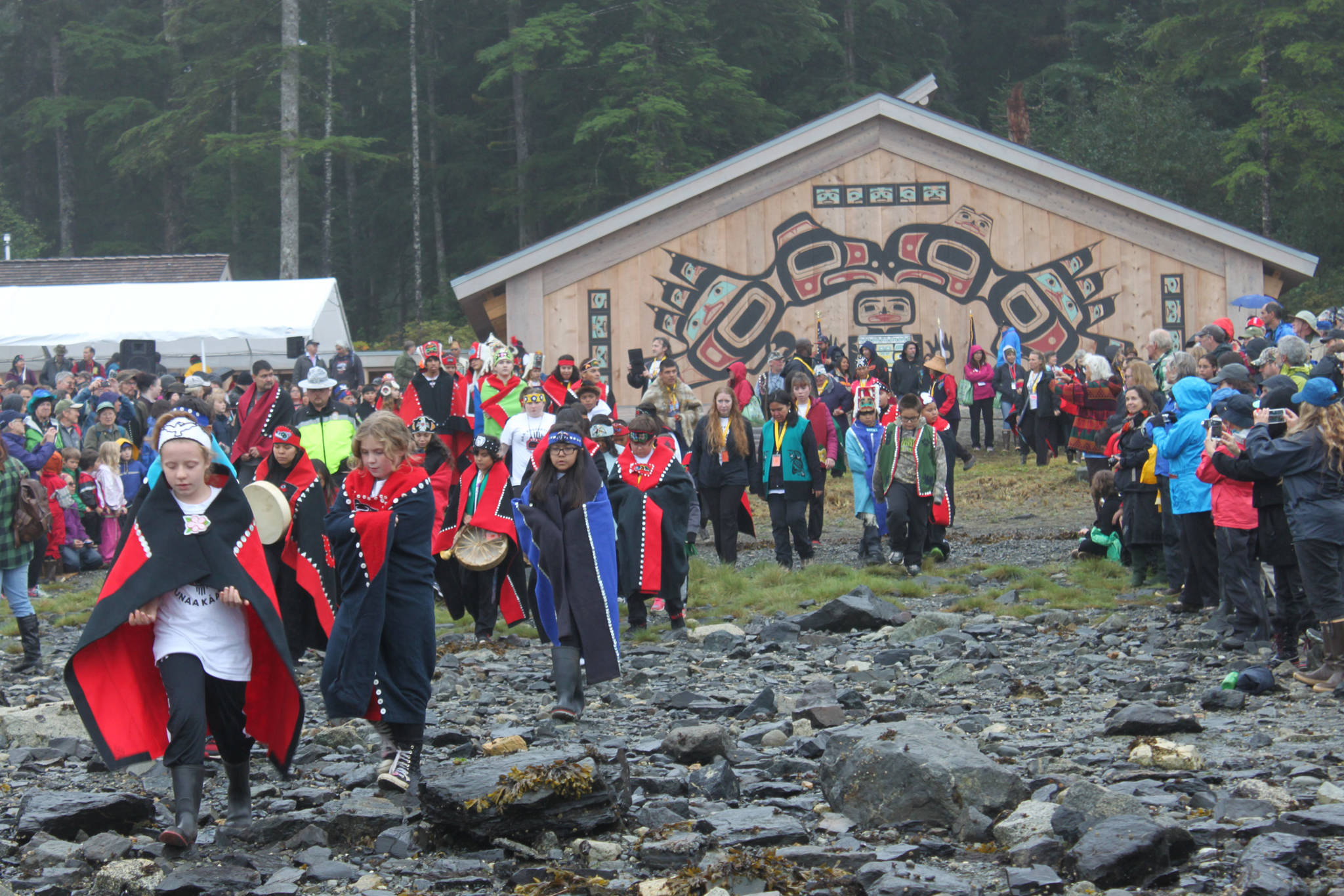Students frp, Hoonah City Schools walk down to Bartlett Cove’s shore on Aug. 25, 2016 to meet the canoes that paddled into Glacier Bay from Hoonah. Mary Catharine Martin | Capital City Weekly