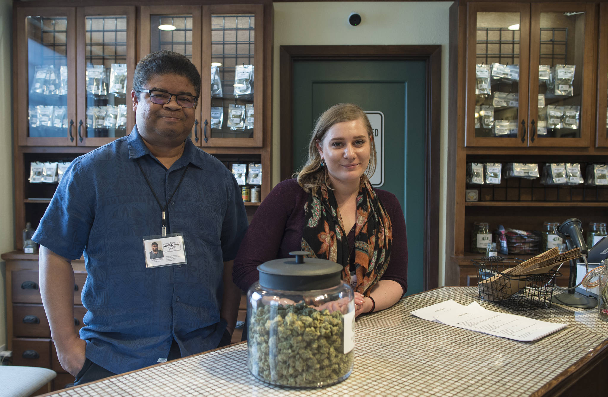 Glacier Valley Shoppe General Manager Adam Gray, left, and Store Manager Grace Doubrava in their new store located at 8505 Old Dairy Road. Glacier Valley Shoppe is the fourth retail outlet for marijuana in Juneau. (Michael Penn | Juneau Empire)