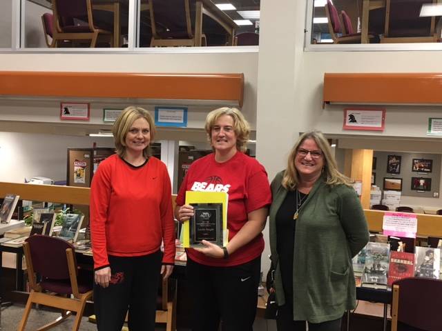 Juneau-Douglas High School Business Education Teacher Lesslie Knight (center) was awarded the 2017-18 Outstanding Business Education Teacher of the Year by the Alaska Association for Career and Technical Education. Knight was presented with the award by PE and health teacher Kelly McCormick (left) and Career Technical Education Coordinator Carin Smolin.