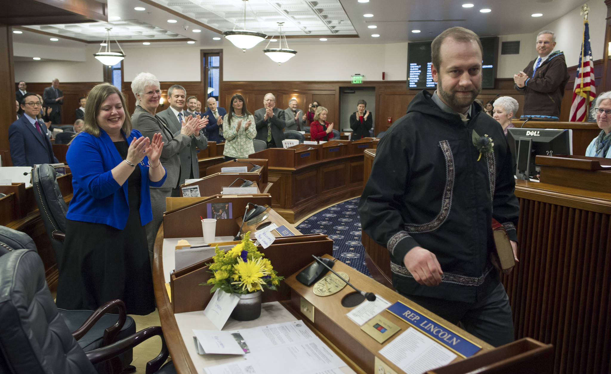 Rep. John Lincoln, D-Kotzebue, walks to his seat after being sworn into office by Speaker of the House Bryce Edgmon, D-Dillingham, in the House chambers on Wednesday, Jan. 31, 2018. Rep. Lincoln is filling the open seat left by former Rep. Dean Westlake, who resigned in December after female aides accused him of unwanted touching and inappropriate comments. (Michael Penn | Juneau Empire File)