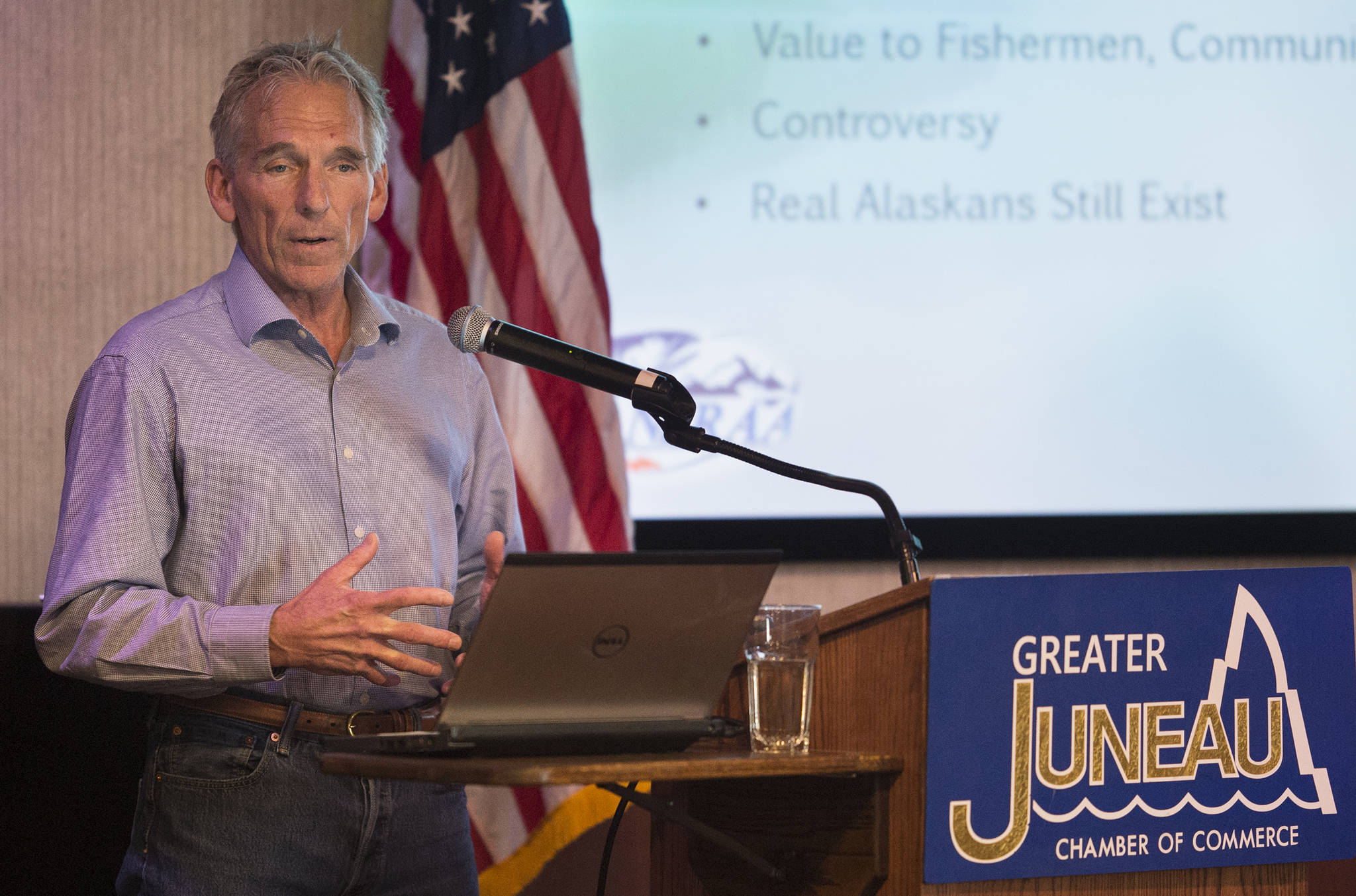Steve Reifenstuhl, general manager of Northern Southeast Regional Aquaculture Association speaks to the Juneau Chamber of Commerce at the Hangar Ballroom on Thursday, March 15, 2018. (Michael Penn | Juneau Empire)