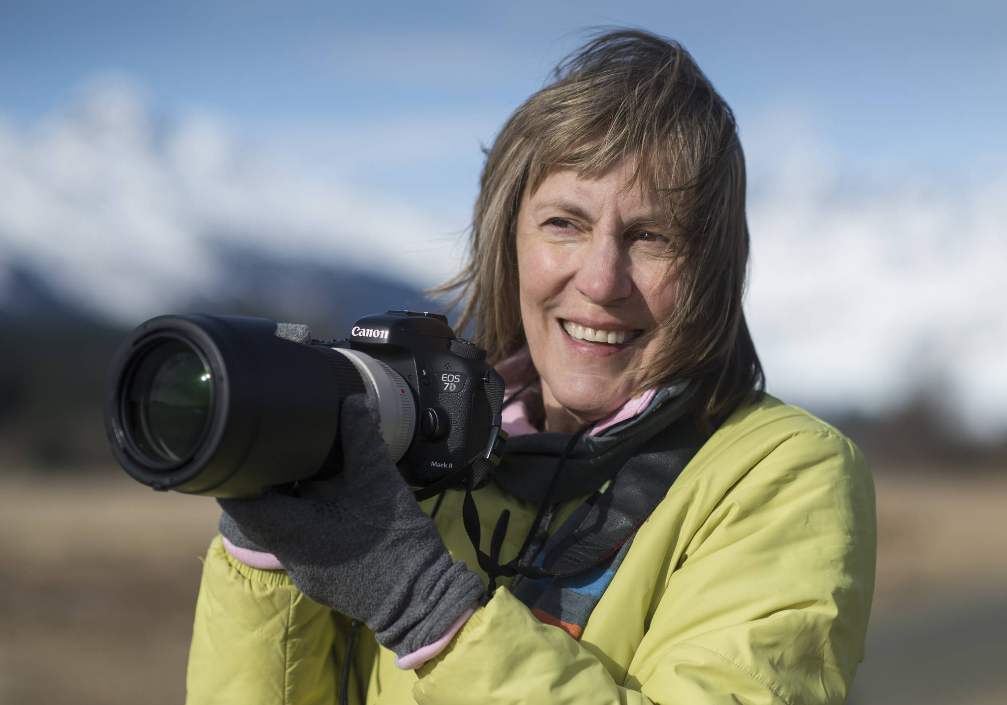 Kerry Howard takes a walk in the Mendenhall Wetlands State Game Refuge on Tuesday, April 3, 2018, to photograph. Howard learned she had Parkinson’s disease two years ago after she noticed a tremble in the little finger on her right hand. (Michael Penn | Juneau Empire)