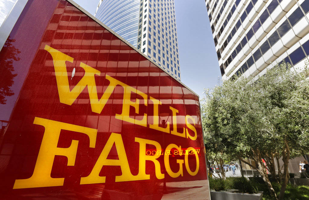 This July 14, 2014 photo shows Wells Fargo offices in Oakland, California. (Ben Margot | The Associated Press File)