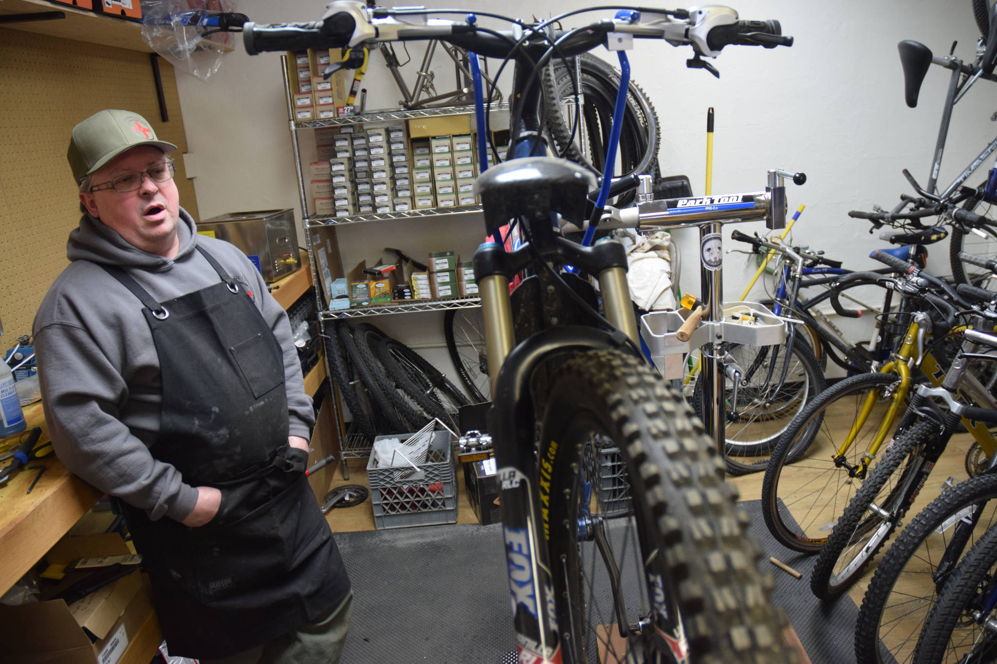 Ken Hill, owner of the newly-opened Bike Doctor shop in the Mendenhall Valley, talks about plans for his business on Friday. (Kevin Gullufsen | Juneau Empire)