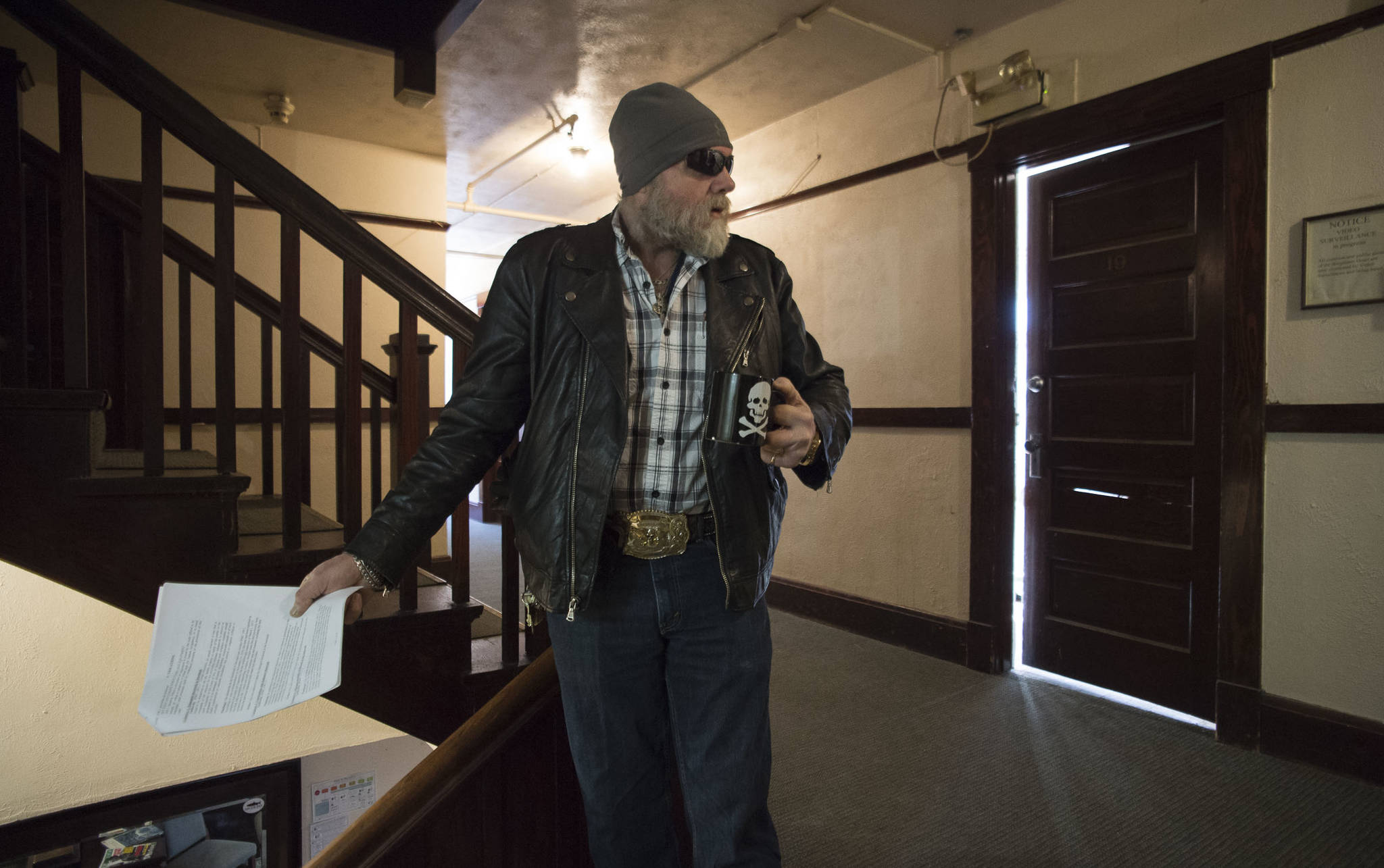 Charles Cotten Jr., then the manager of the Bergmann Hotel, takes the Juneau Empire on a tour of the facility on Friday, March 10, 2017. (Michael Penn | Juneau Empire File)