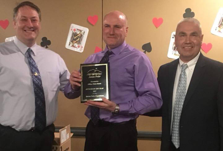 School Resource Officer Blain Hatch (center) poses with Juneau Police Deputy Chief David Campbell (left) and Chief Ed Mercer. Hatch was named Officer of the Year at an awards banquet this past weekend. (Courtesy photo | Juneau Police Department)