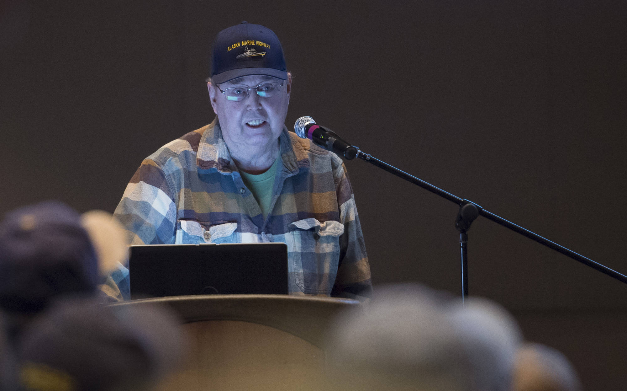Larry Edfelt, chair of the Fisheries Committee of Territorial Sportsmen Inc., speaks at the King Salmon Symposium sponsored by the Territorial Sportsmen at Centennial Hall on Monday, April 16, 2018.