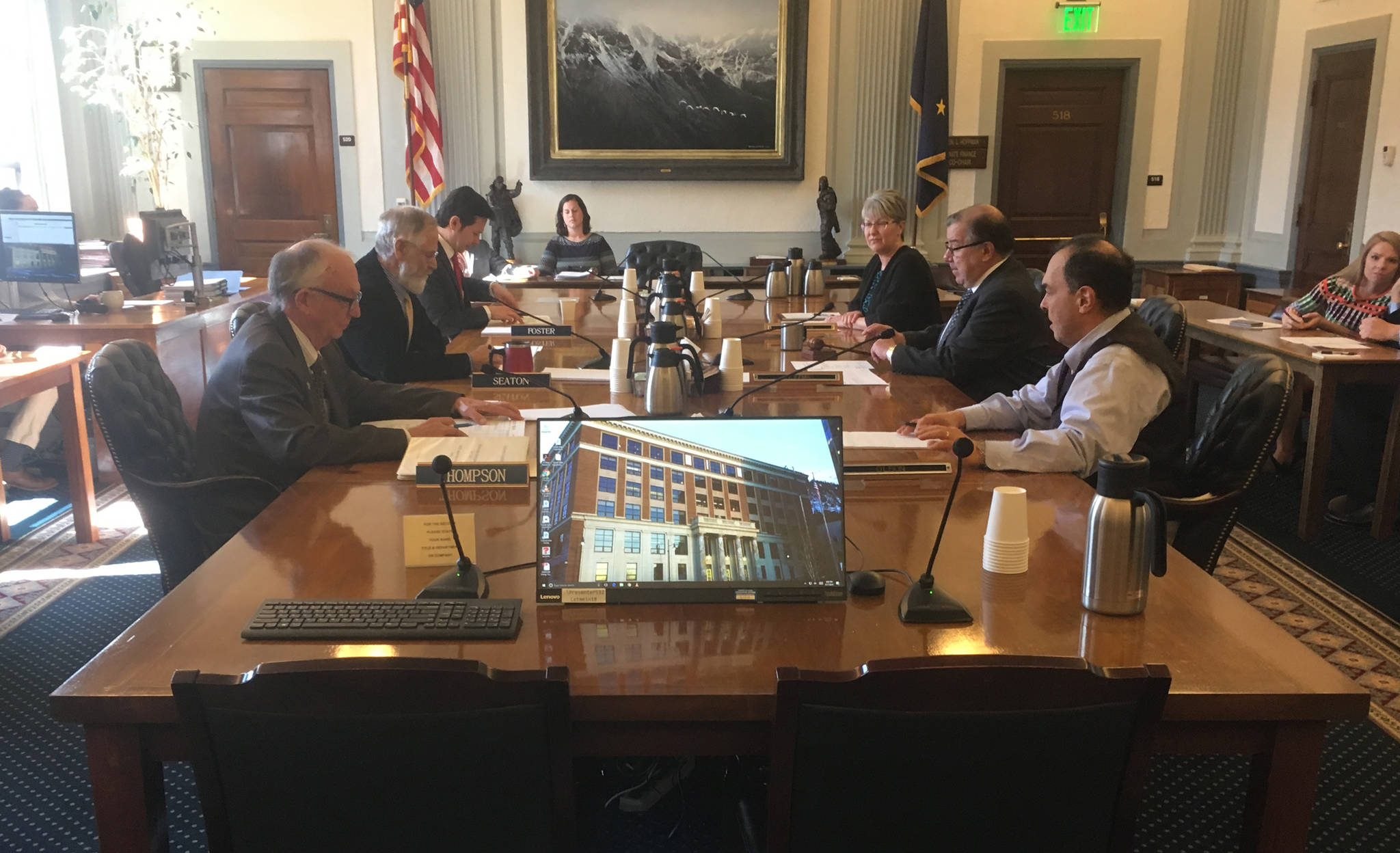 Members of the House-Senate conference committee on the budget meet Tuesday afternoon, April 17, 2018 in the Senate Finance committee room of the Alaska State Capitol. (James Brooks | Juneau Empire)