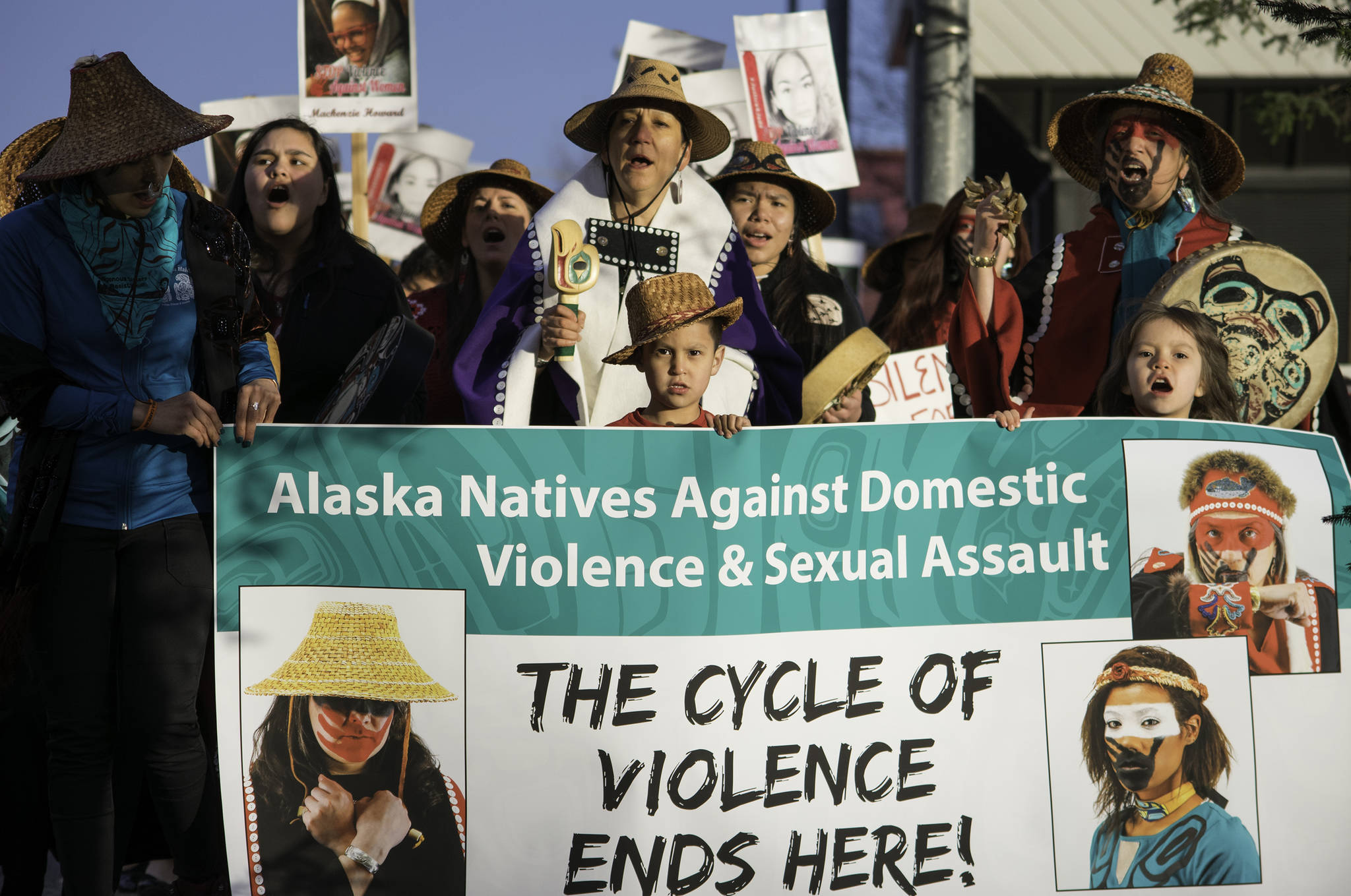 Demonstrators march in the Violence Against Women Awareness Rally near Elizabeth Peratrovich Hall on Friday, April 20, 2018. (Richard McGrail | Juneau Empire)
