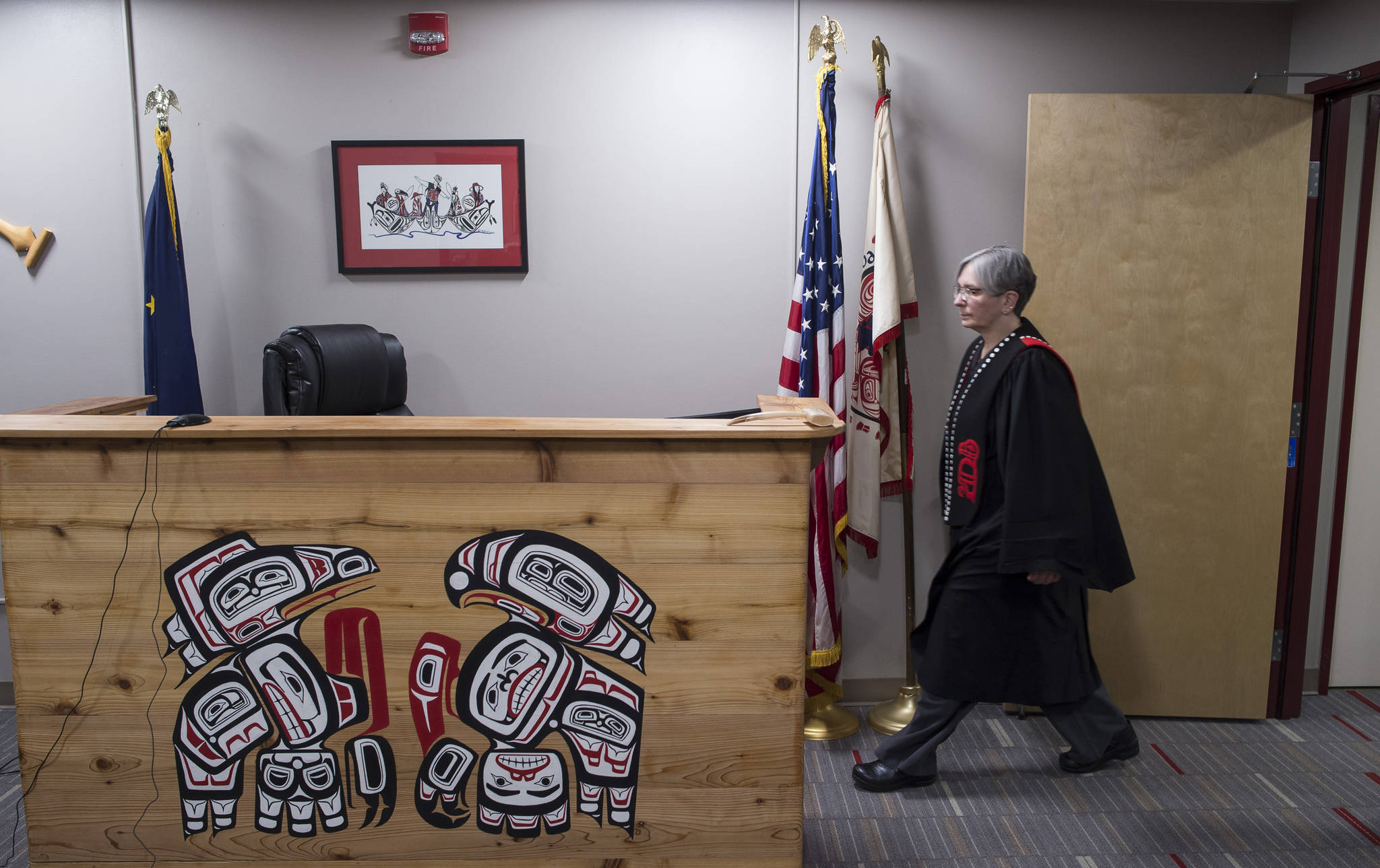 Judge Debra O’Gara enters the Central Council Tlingit and Haida Indian Tribes of Alaska’s Tribal Court on Wednesday, March 14, 2018. (Michael Penn | Juneau Empire)