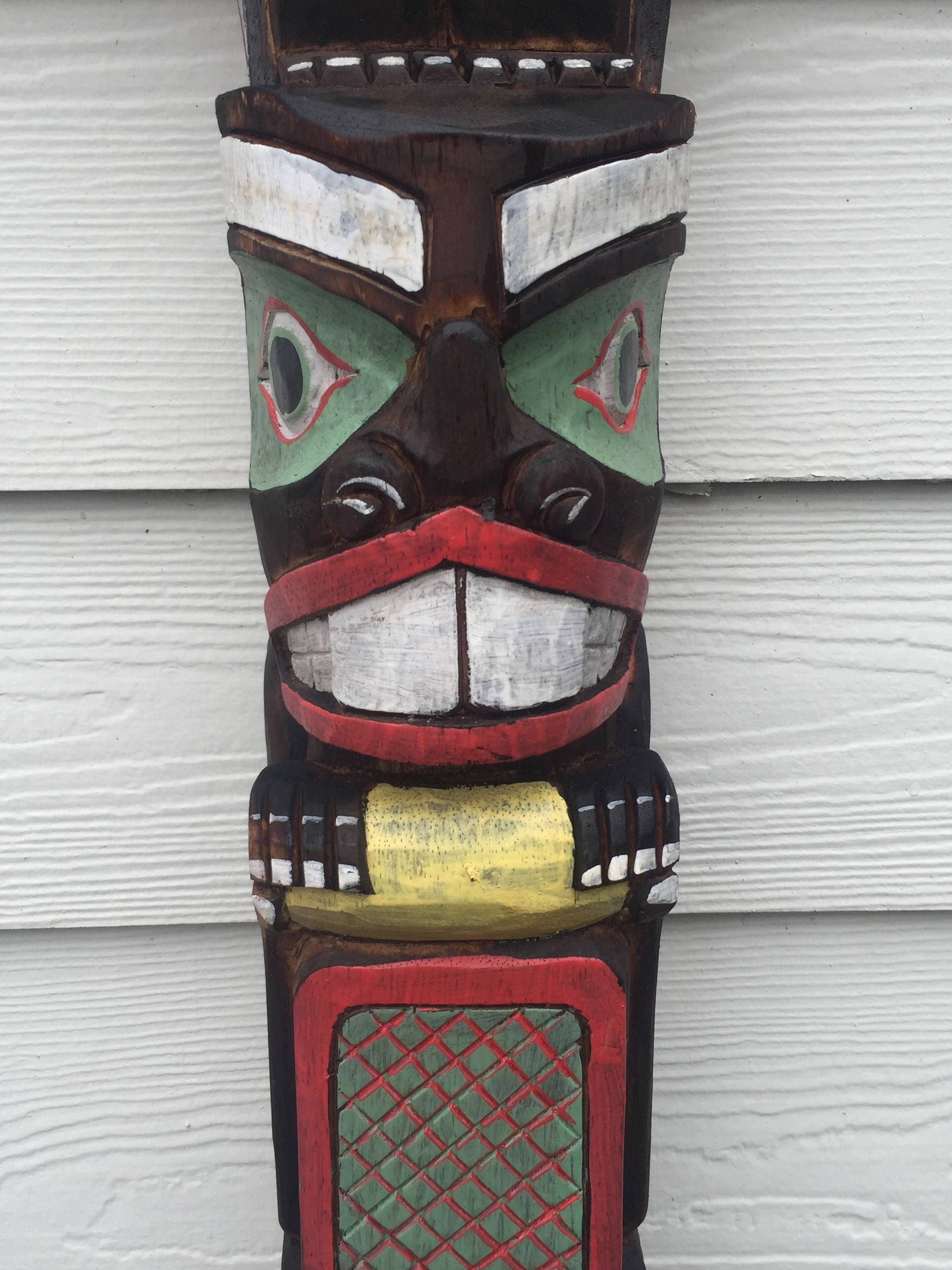 A non-authentic totem pole in front of a gallery in Sitka.Vivian Mork Y&