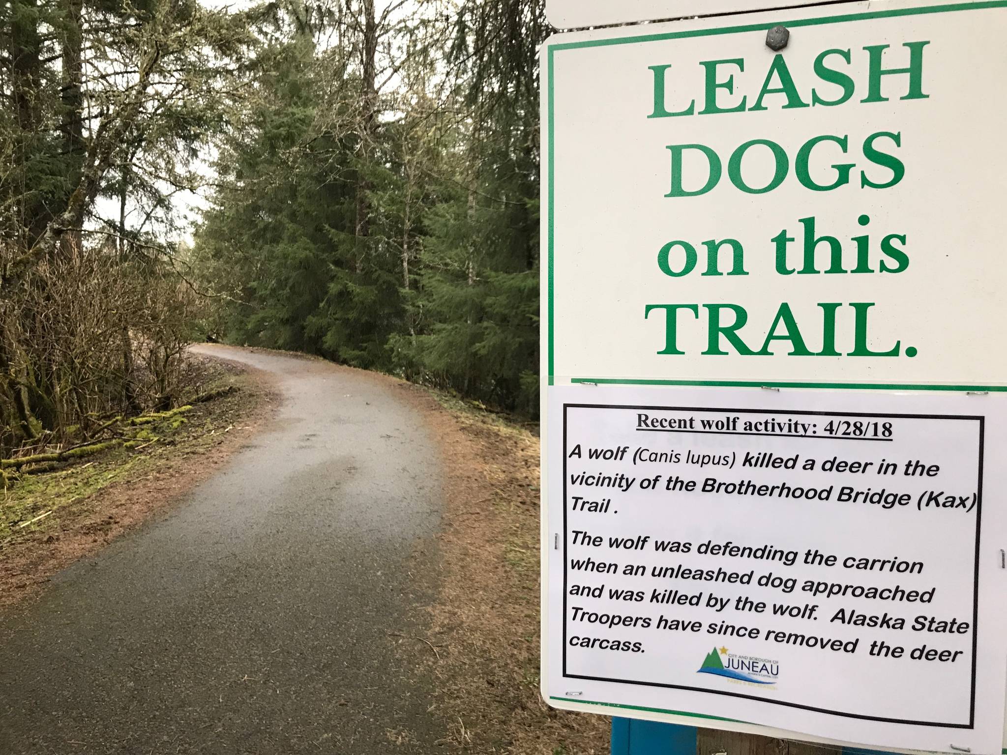 A warning sign posted at Brotherhood Bridge by the Alaska Department of Fish and Game on Monday, April 30, 2018. (Michael Penn | Juneau Empire)