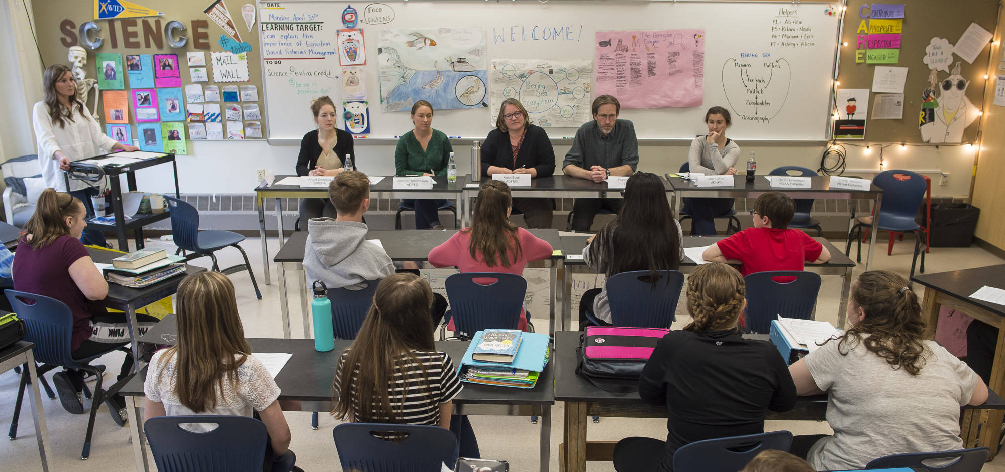A panel of professionals meet with teacher Jessica Cobley’s 7th-grade science class to hear about students work on understanding the Bering Sea ecosystem at Floyd Dryden Middle School on Tuesday, May 1, 2018. (Michael Penn | Juneau Empire)