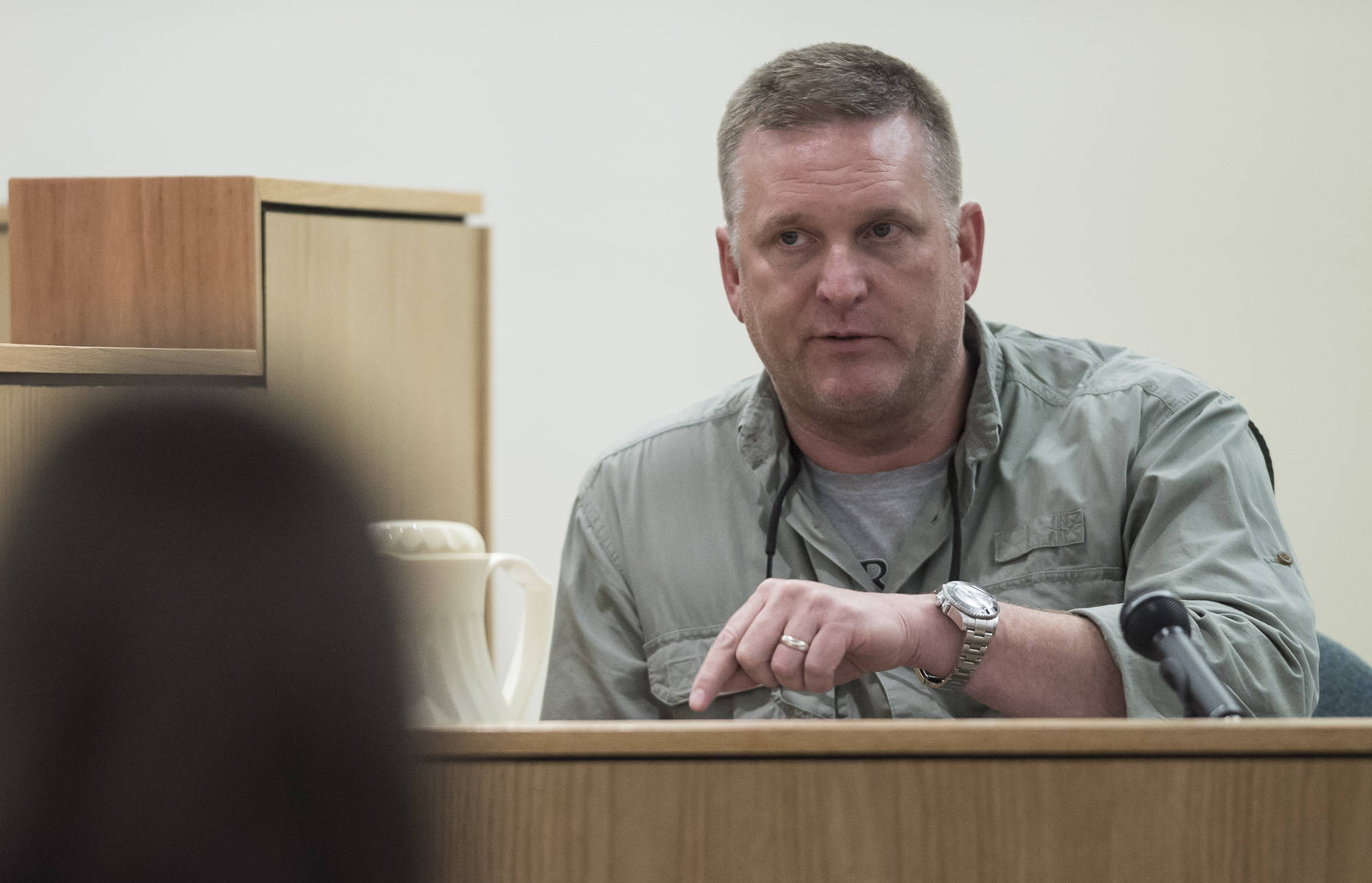 Vince Bengston, a member of a 2016 hunting party, testifies in the trial of Mark De Simone in Juneau Superior Court on Wednesday, May 2, 2018. De Simone is accused of killing Duilio Antonio “Tony” Rosales during a hunting trip in Excursion Inlet in 2016. (Michael Penn | Juneau Empire)