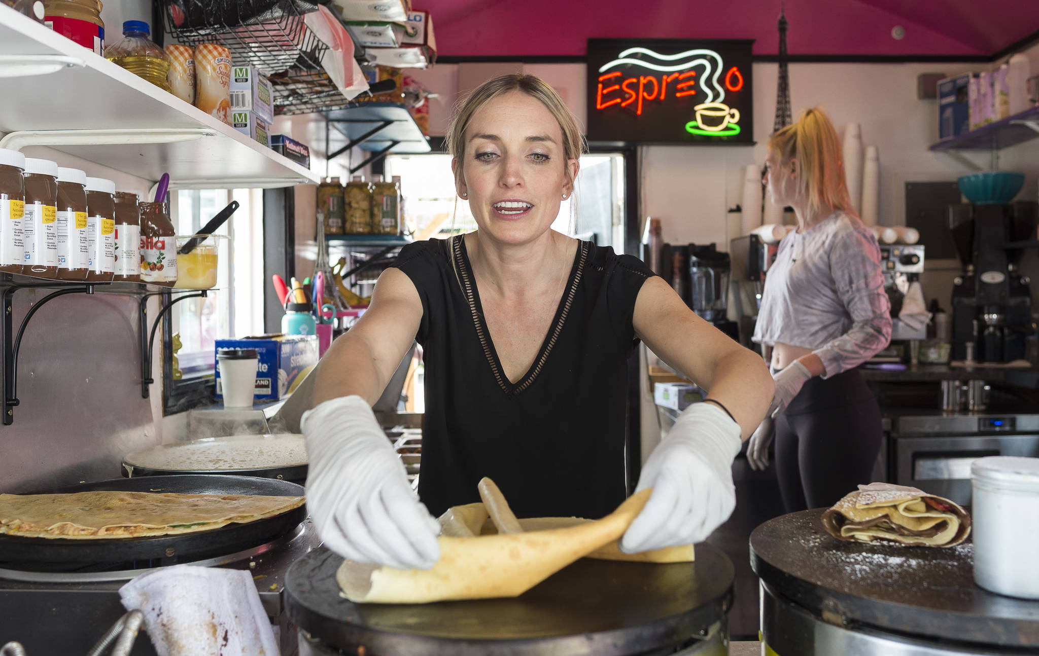 Crepe Escape owner Amanda Kohan talks about her recent break-in while making crepes during the lunchtime rush on Tuesday, May 15, 2018. (Michael Penn | Juneau Empire)