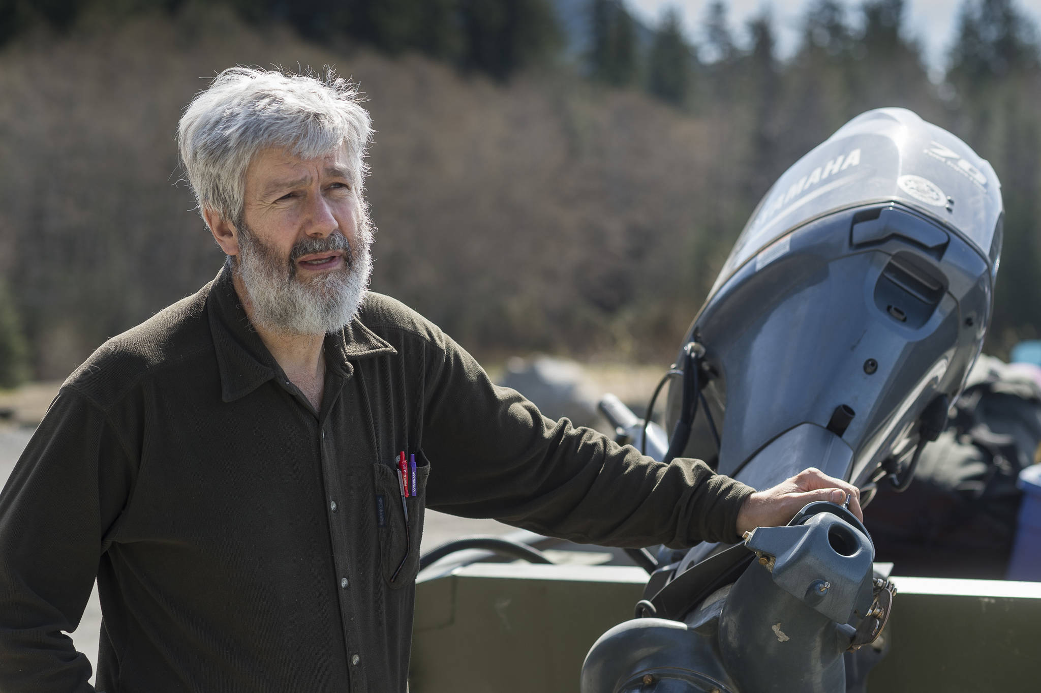 Leon Shaul, a ADFG Fisheries Biologist III who studies coho and other fish species, talks about Southeast Alaska salmon stocks as he helps load boats for staff leaving Echo Cove for a six-week fish study in Berners Bay on Tuesday, May 8, 2018. Shaul, a Douglas resident, has worked for the department for over 30 years. (Michael Penn | Juneau Empire)