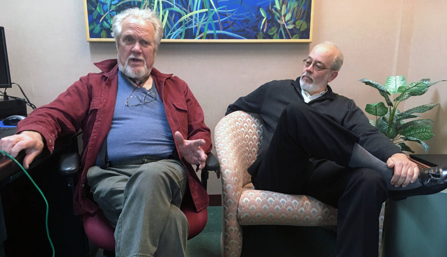 Eric Forrer, left, and Joe Geldhof, right, have sued the state of Alaska in an attempt to stop a plan that calls for borrowing up to $1 billion from global bond markets to pay oil and gas tax credits owed by the state. They are pictured May 22, 2018 in an interview at the Juneau Empire. (James Brooks | Juneau Empire)