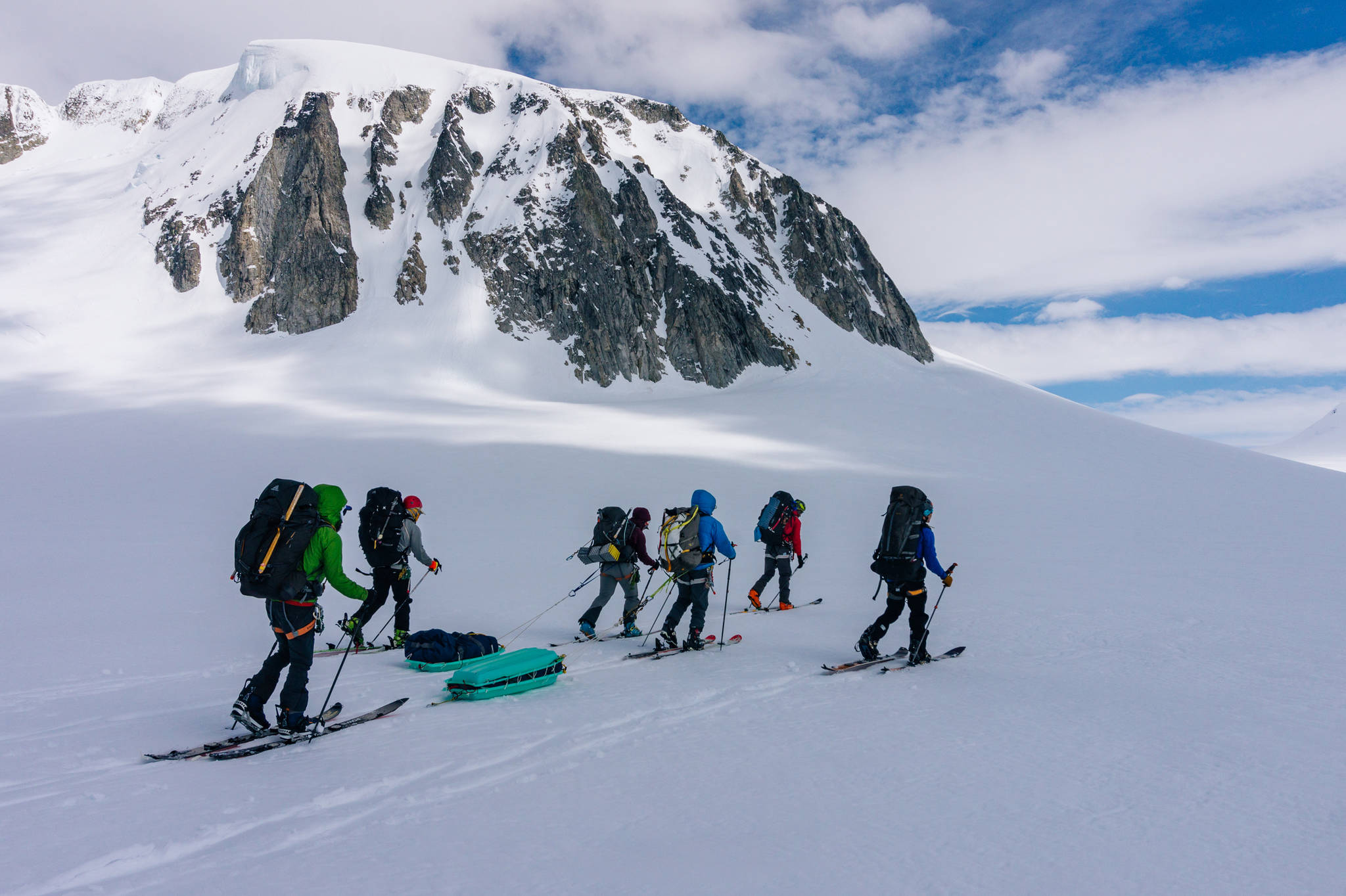 All steam ahead with huge packs and sleds. (Gabe Donohoe | For the Juneau Empire)