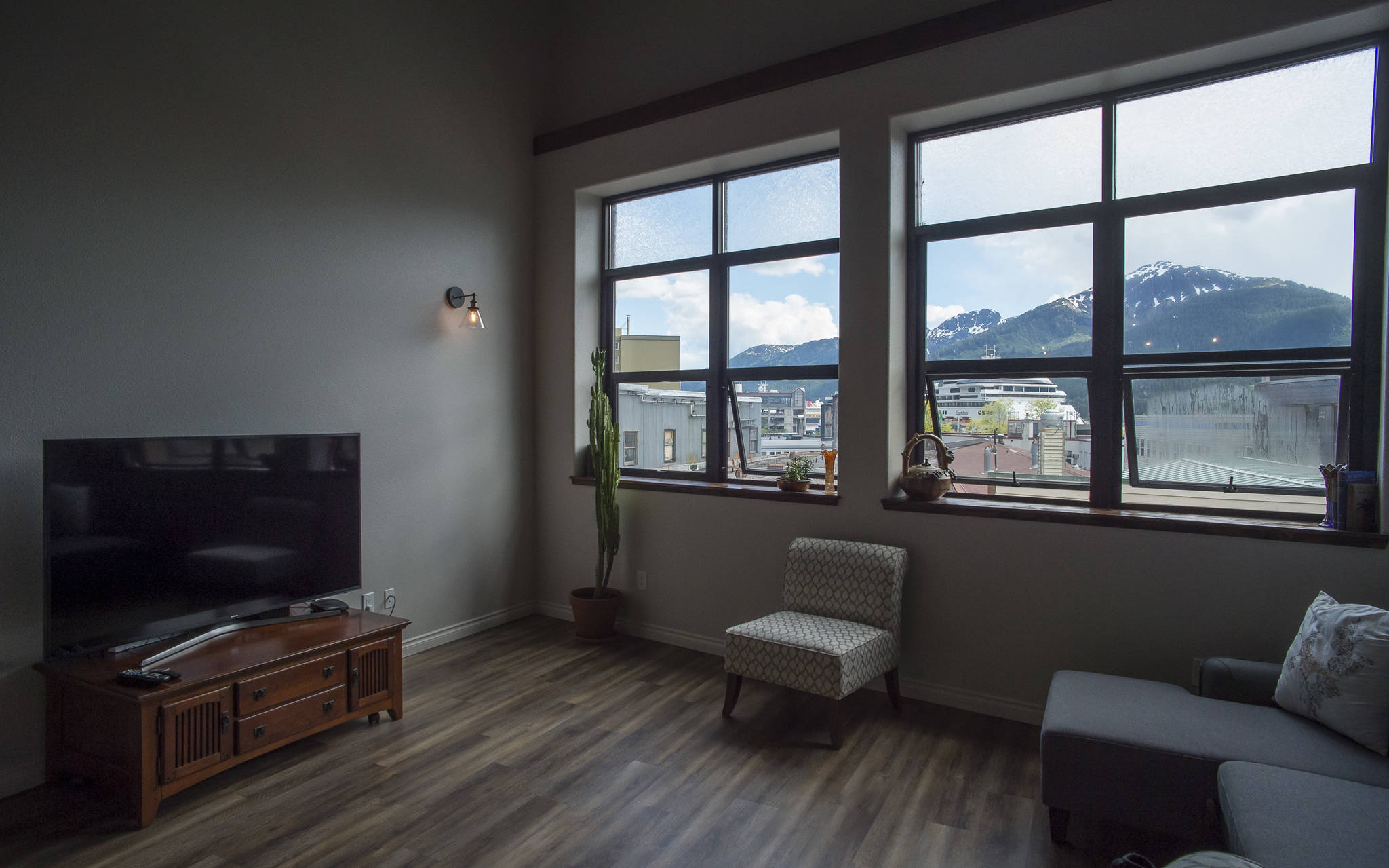 Livingroom view from the Hellenthal Lofts on Front Street on Friday, June 8, 2018. (Michael Penn | Juneau Empire)