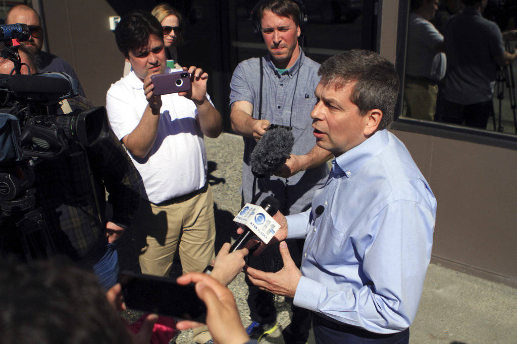 Former Alaska U.S. Sen. Mark Begich answers reporters’ questions after filing to run for governor in the 2018 Democratic primary at the state Division of Elections office on Friday, June 1, 2018, in Anchorage, Alaska. Begich is a former two-term mayor of Anchorage. He lost his U.S. Senate re-election bid in 2014 to current U.S. Sen. Dan Sullivan, a Republican. (AP Photo/Dan Joling)