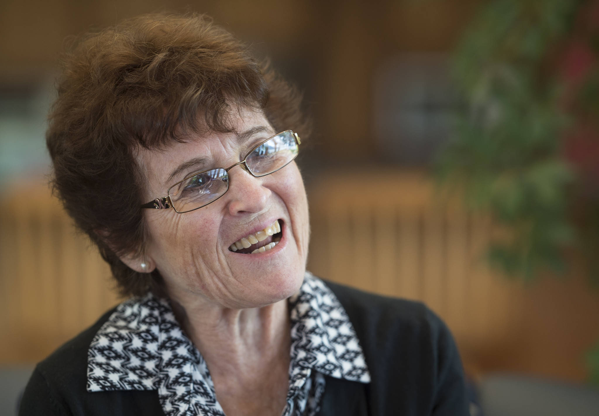 Marjorie Menzi talks on Tuesday, June 19, 2018, at her Thane home about her work in government and teaching Juneau students about how their goverment works. (Michael Penn | Juneau Empire)