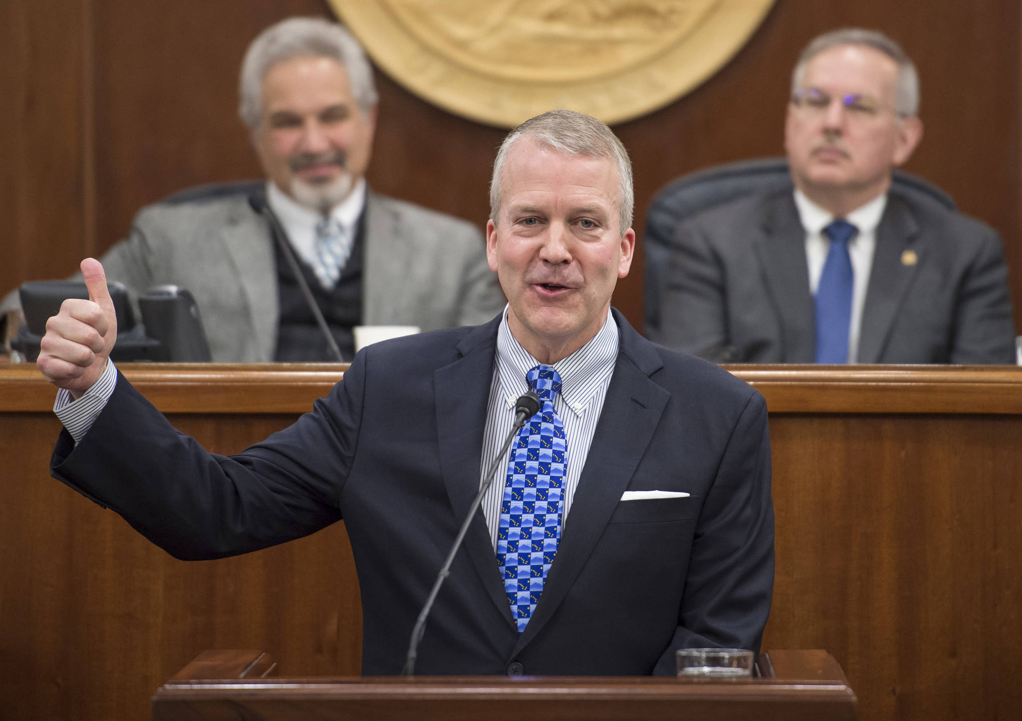 In this Feb. 26 photo, U.S. Sen. Dan Sullivan, R-Alaska, gives a thumbs up while speaking about the opening of the Arctic National Wildlife Refuge to oil drilling during his annual speech to a joint session of the Alaska Legislature at the Capitol. (Michael Penn | Juneau Empire File)
